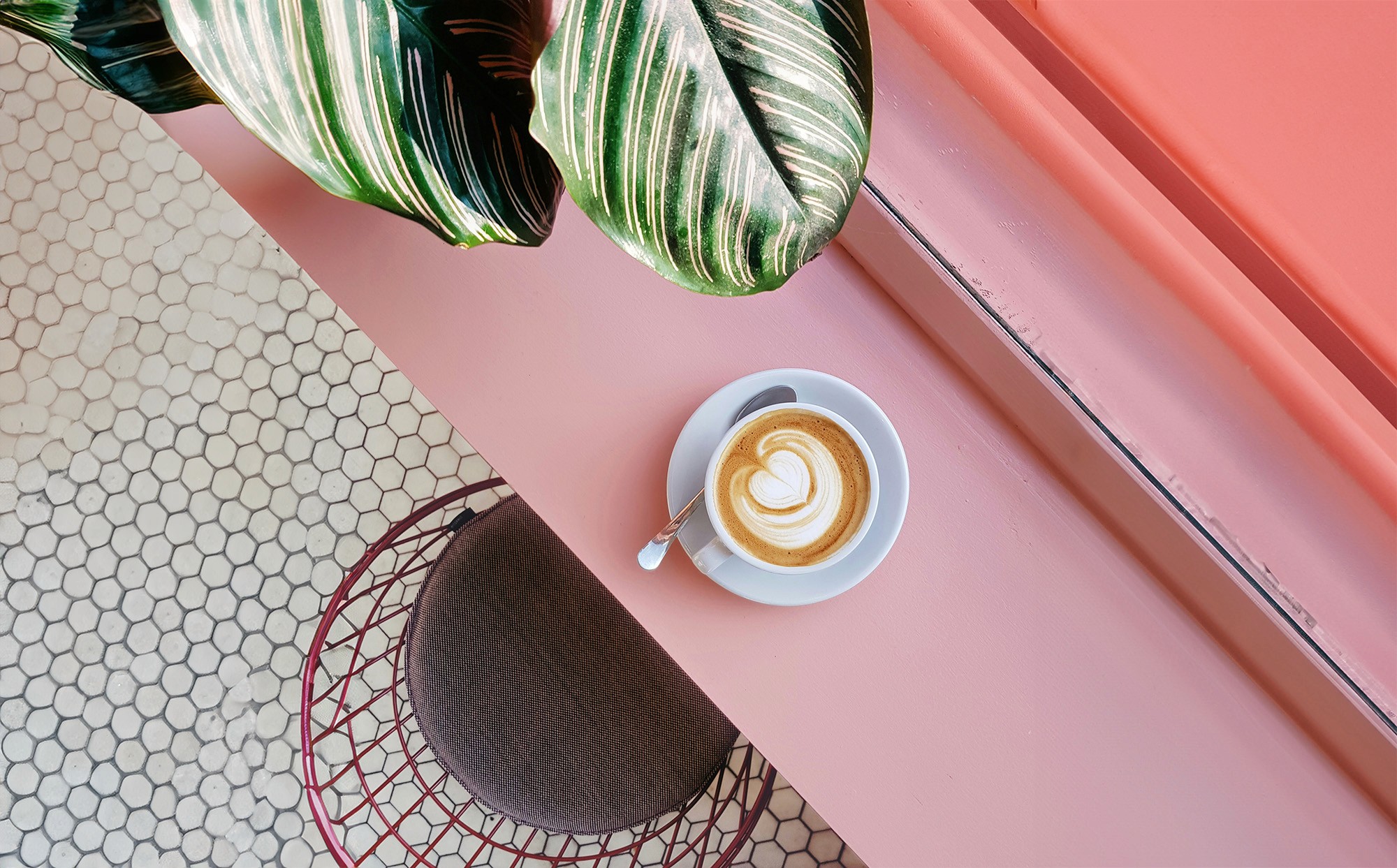 Coffee shop at a window seat with a coffee