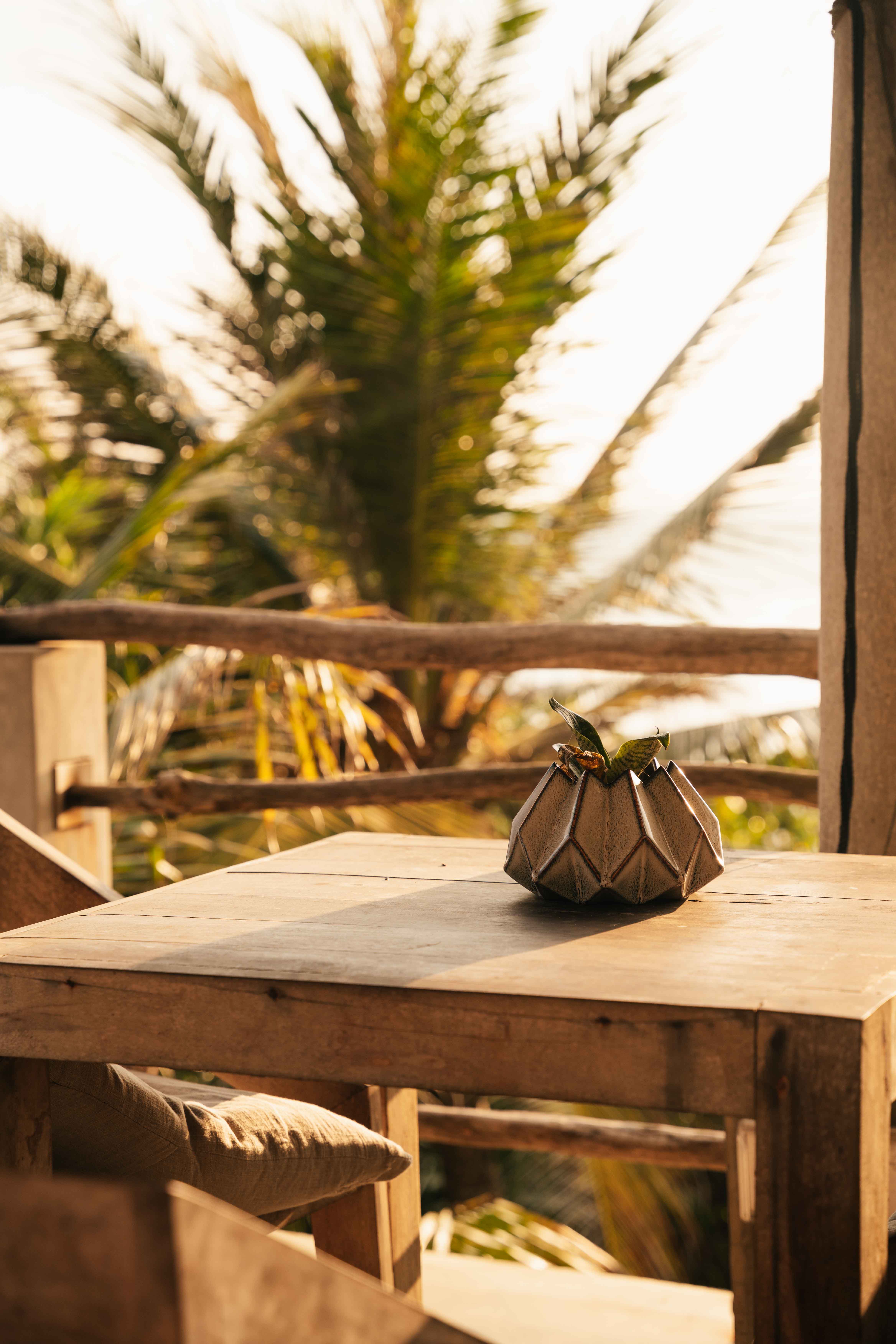Table at a rooftop terrace at golden hour light