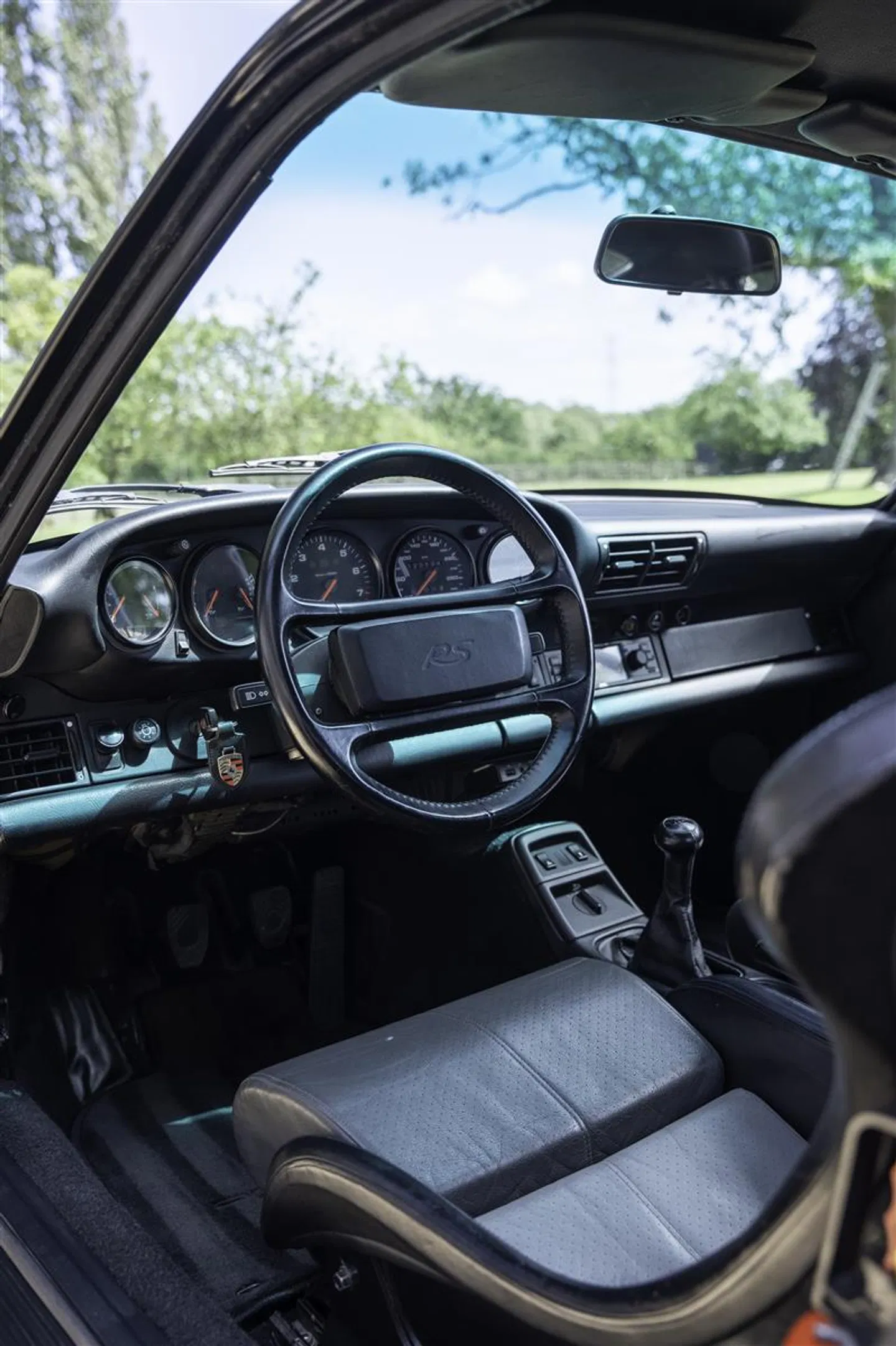 Driver’s side cabin with RS steering wheel and lightweight bucket seat