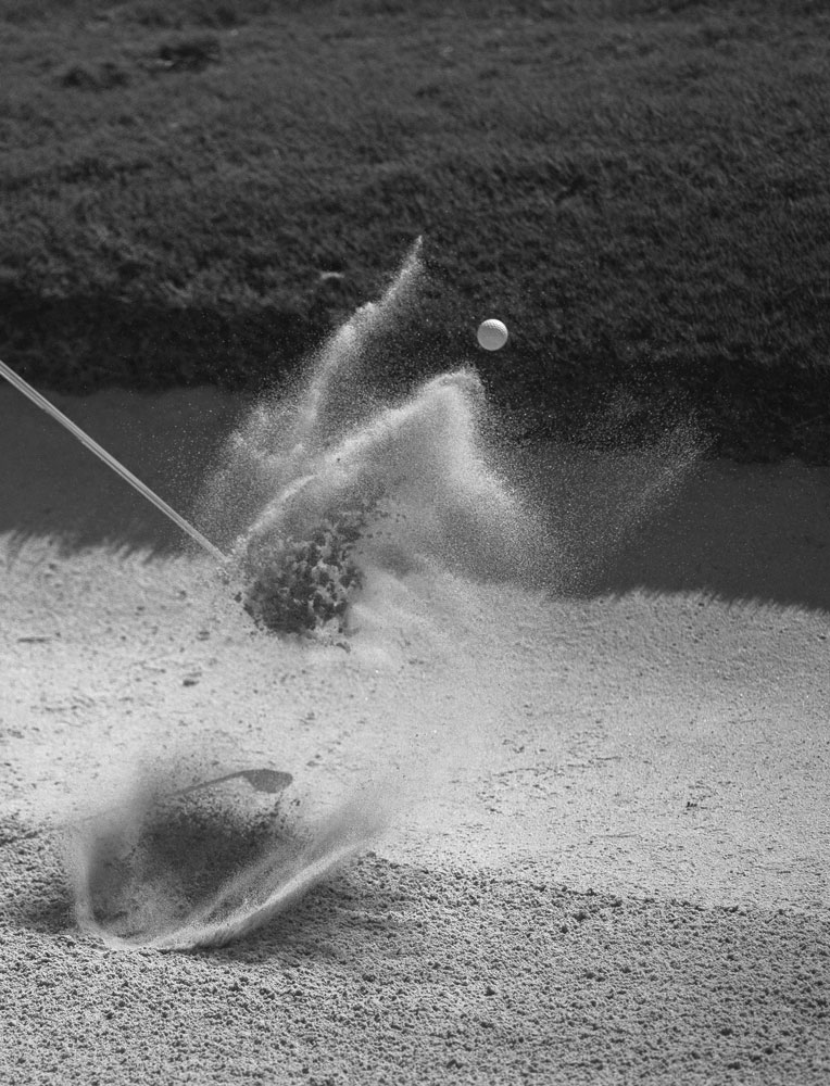 Bottles of skincare products displayed on shelves.