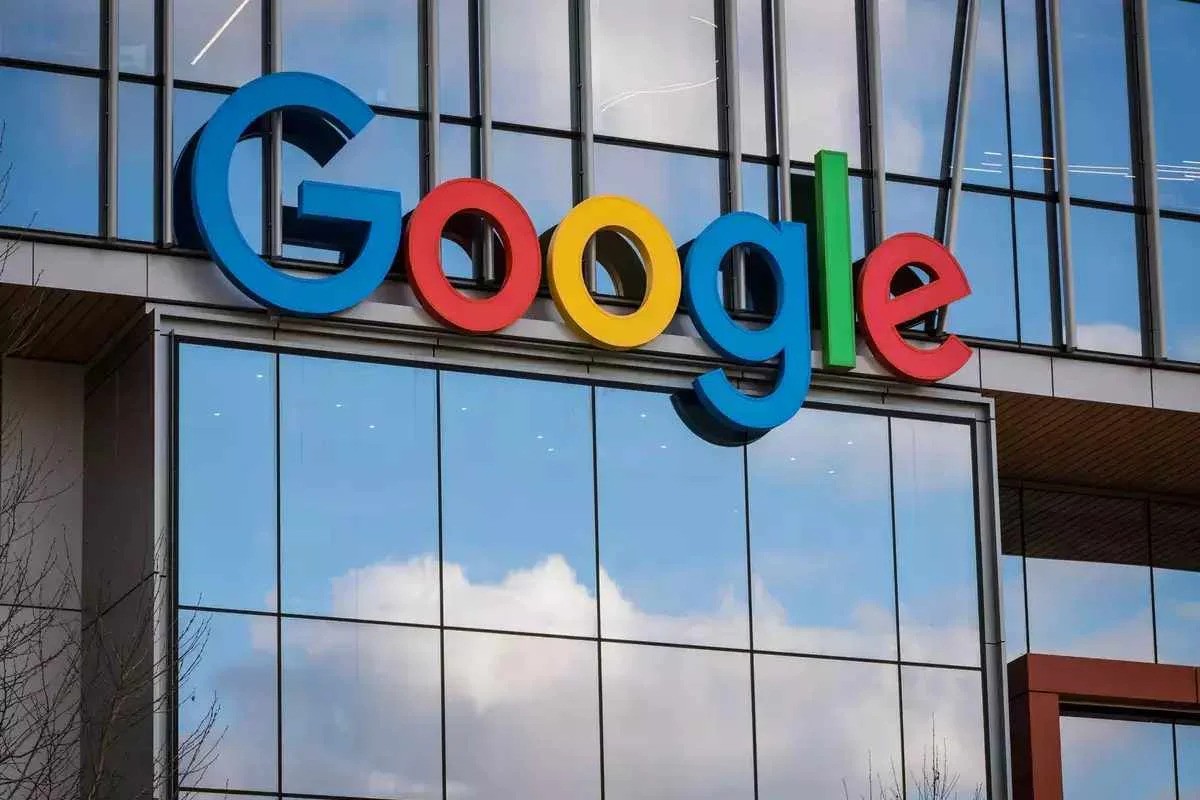 An exterior view of a building featuring a Google logo visibly displayed. The logo is large, colorful, and easily recognizable, with each letter in a distinct color: blue, red, yellow, and green.