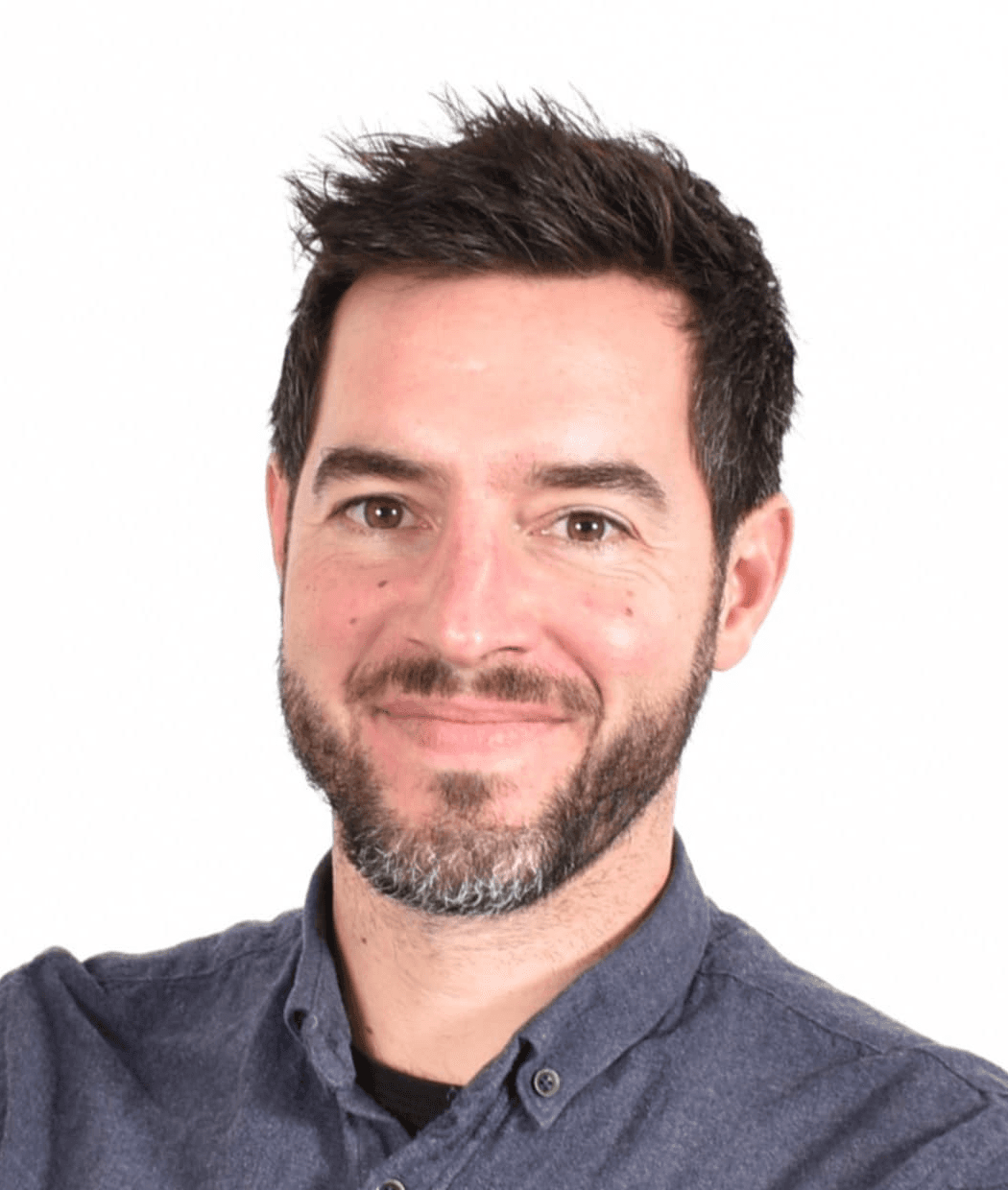 Profile view of a man with red hair and beard