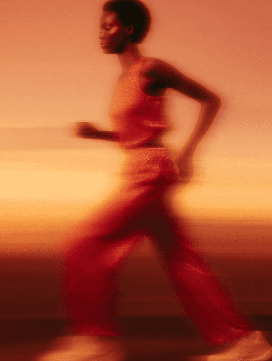 black and gray film camera near printed photos