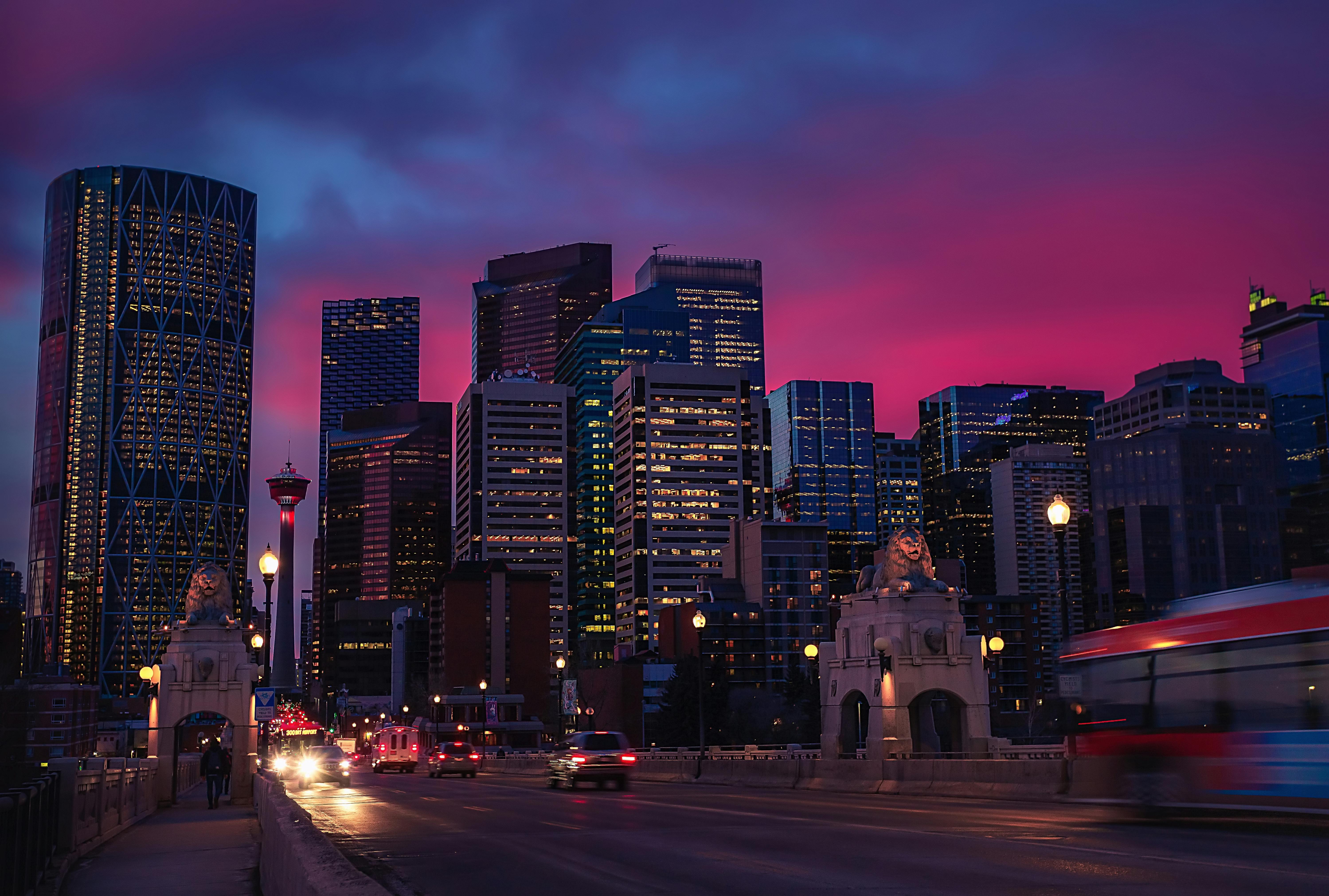 downtown Calgary light up by the lights of skyscrapers and the Calgary tower