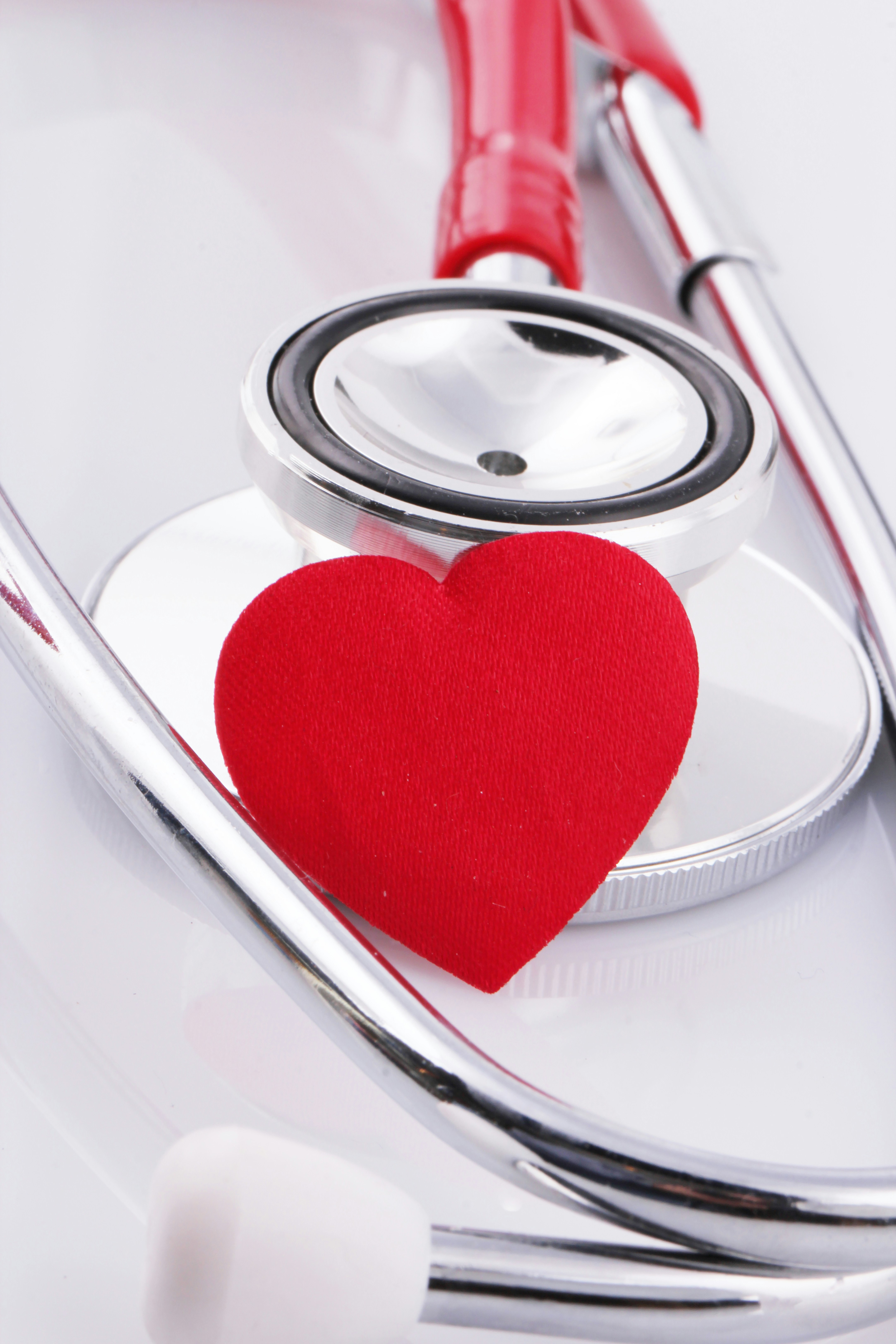 a stethoscope and a heart on a plate