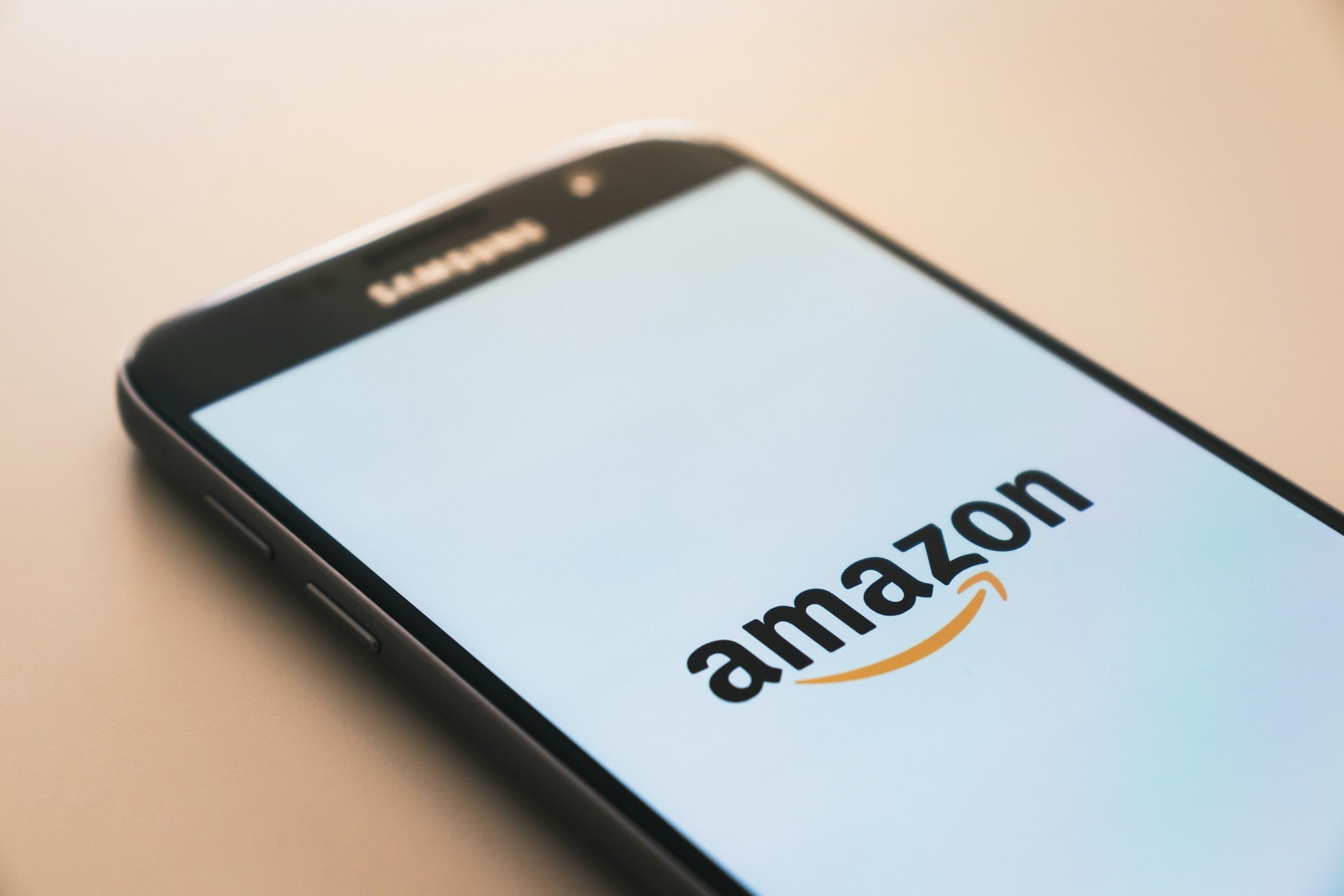 Amazon logo displayed on a smartphone screen
