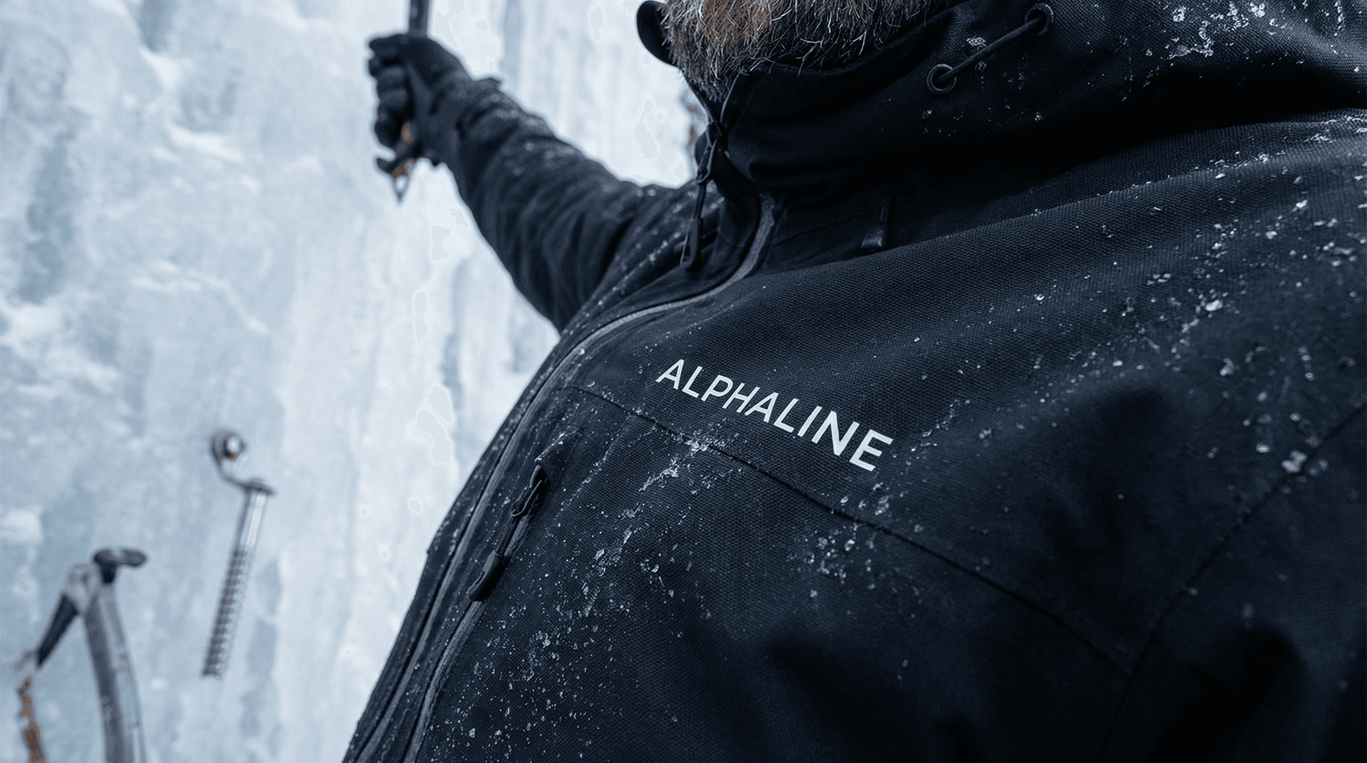 Close-up of an ALPHALINE jacket worn during an ice-climbing scene