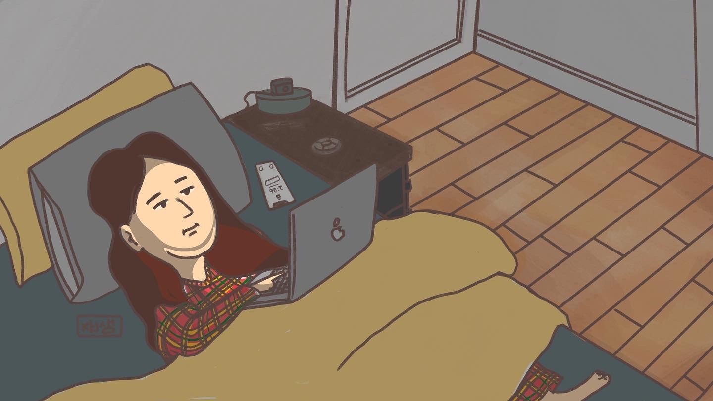 silver iMac turned on inside room