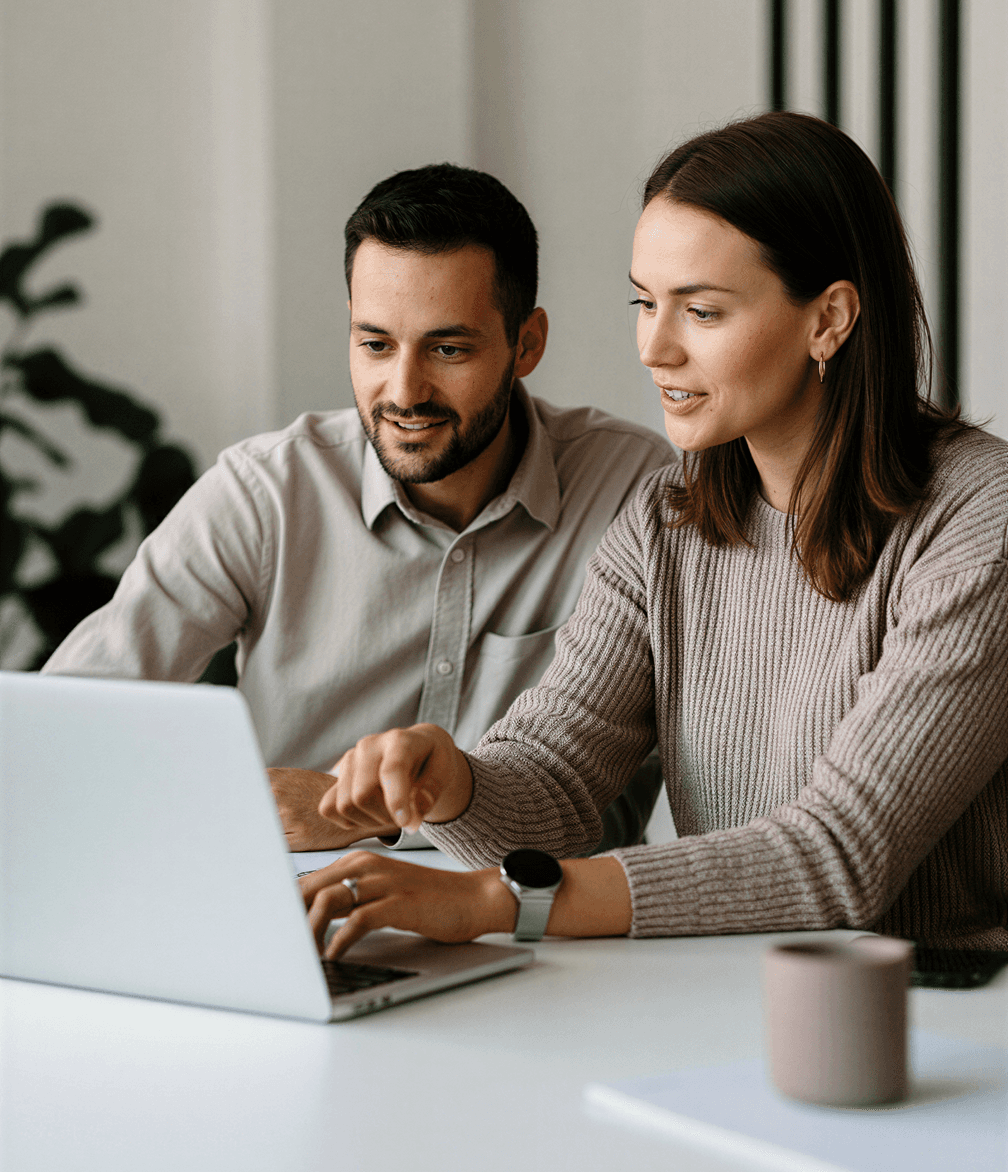 Business consultant and client meeting at a desk men women
