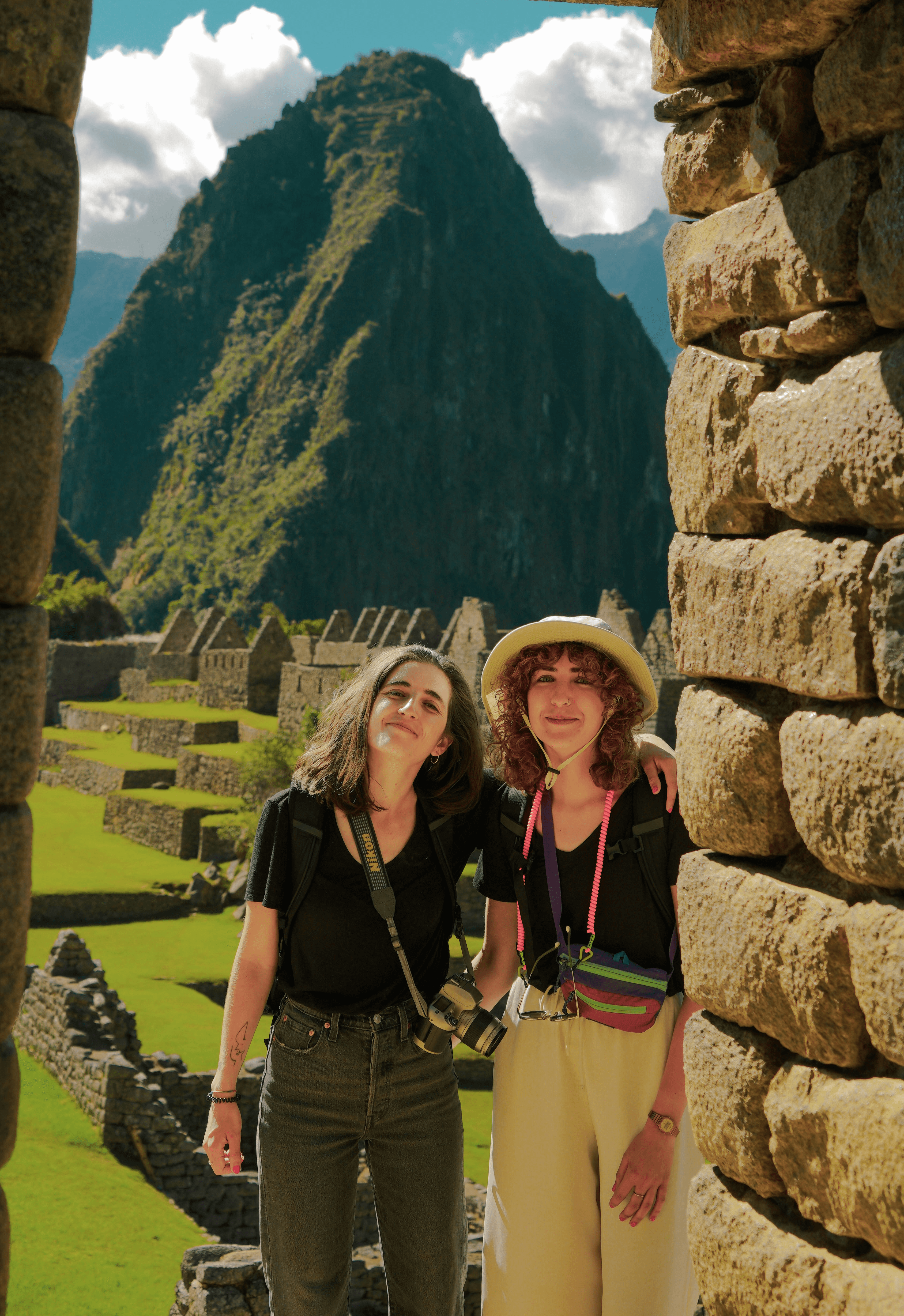 a couple of women standing next to each other