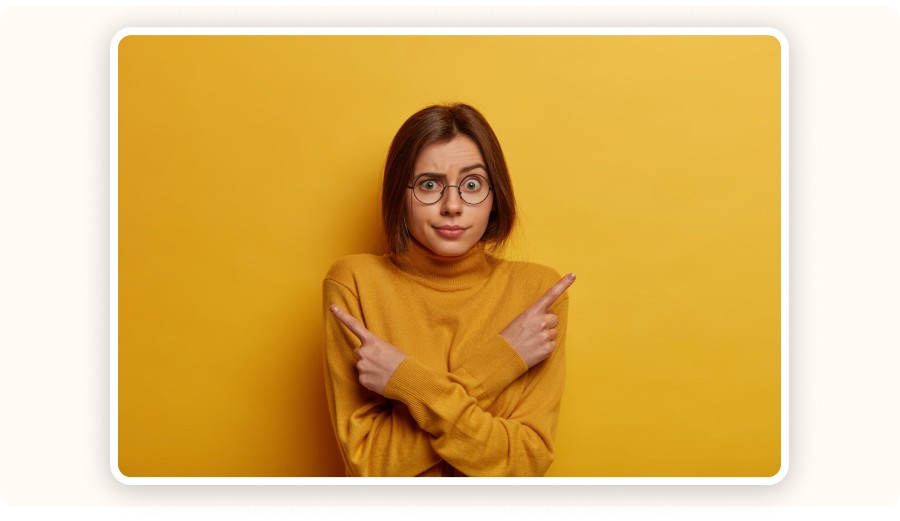 Confused woman pointing both directions, symbolizing choice or comparison decision
