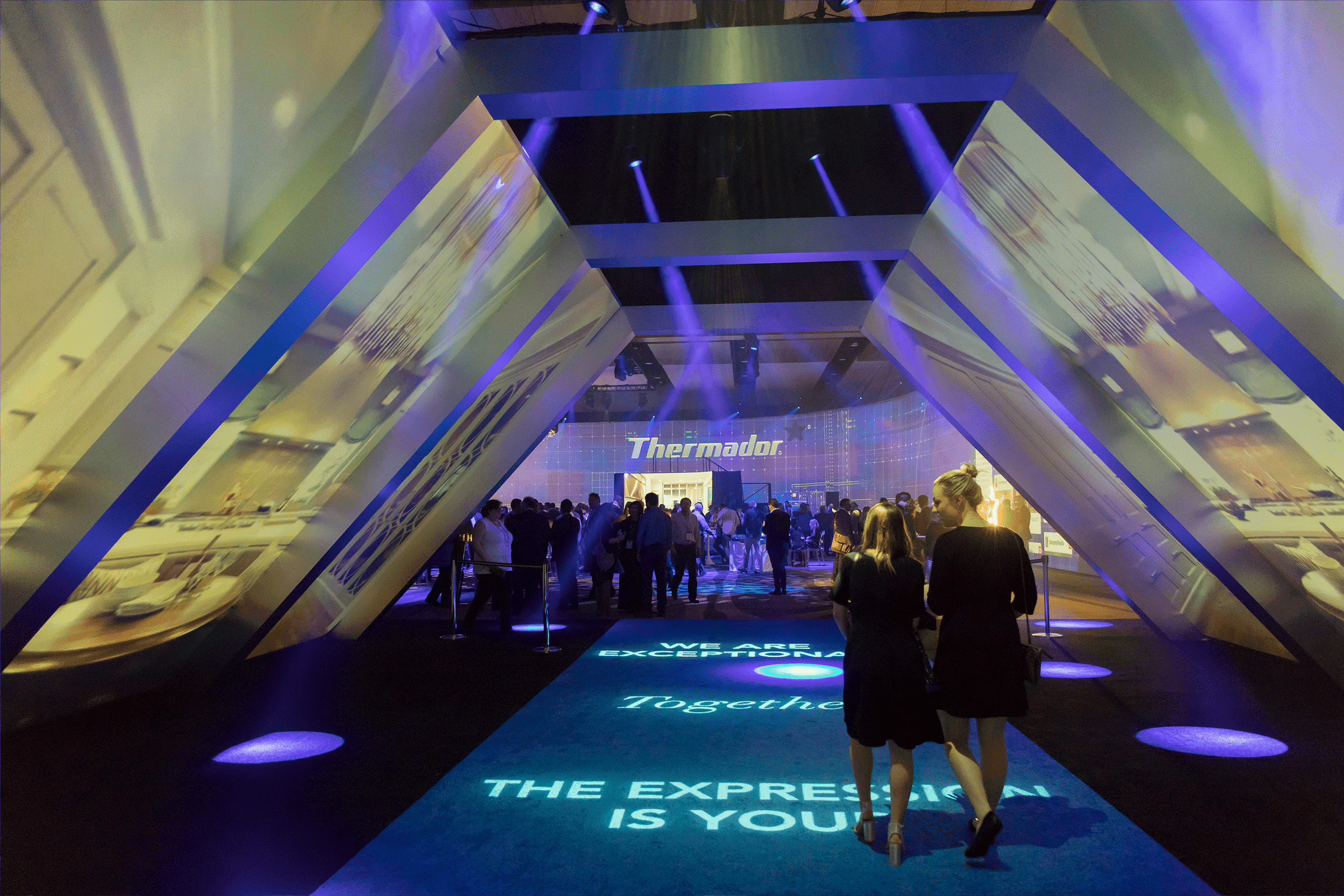 Thermador entrance tunnel with projection lighting and mapping as attendees enter into the demonstration room