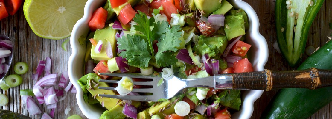 a healthy veggie salad with avocado