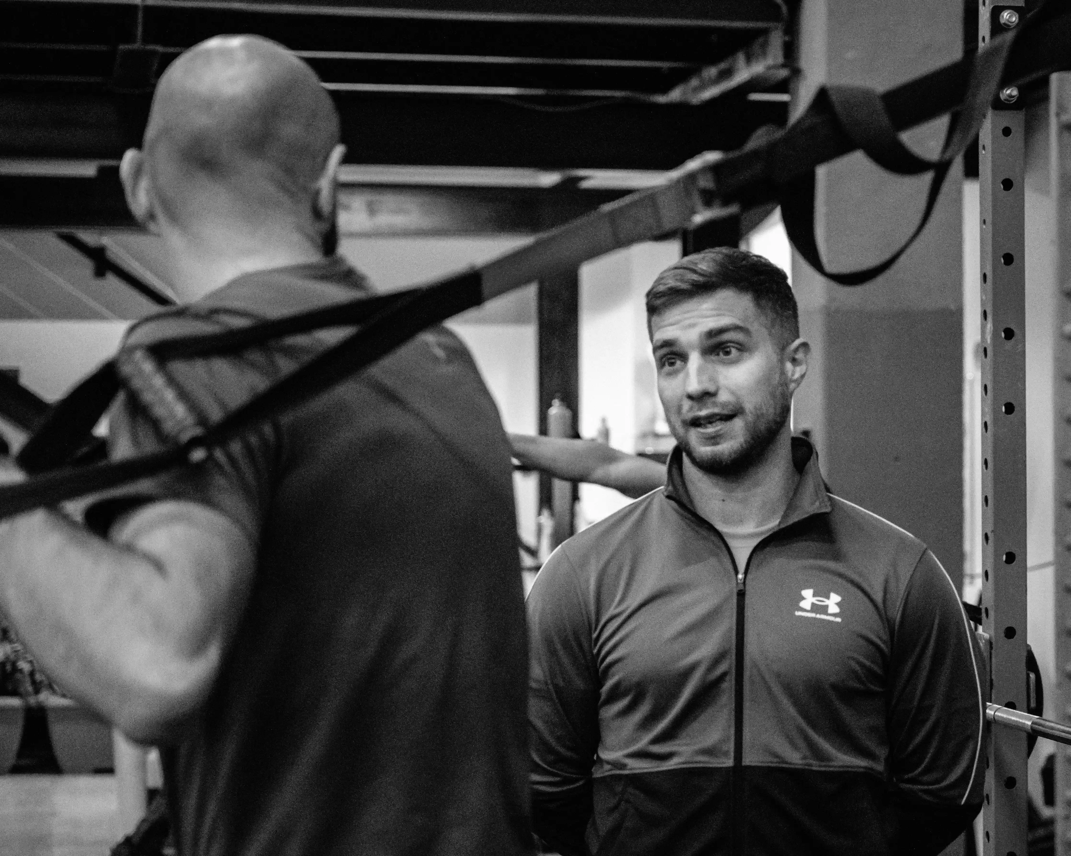 Sportoló konzultál az edzőjével