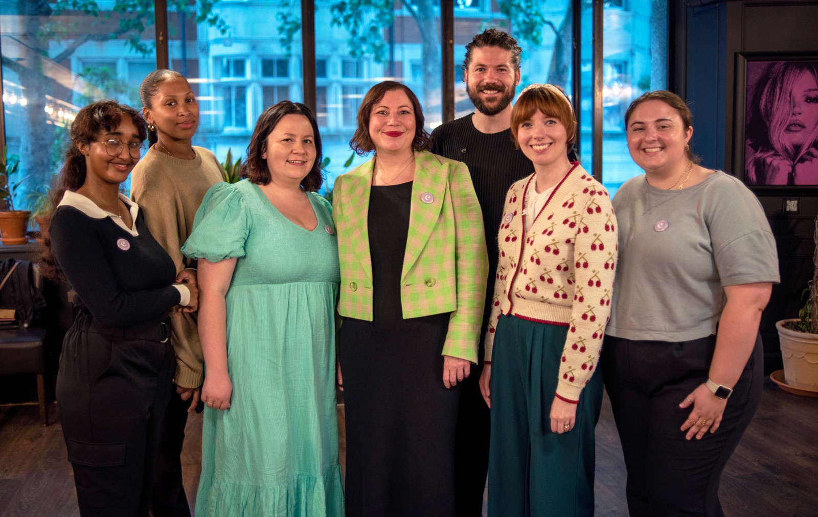 Carefree team members stand together at a Vouchsafe event celebrating their £1m raise to build inclusive identity verification, enabling access to breaks for unpaid carers.