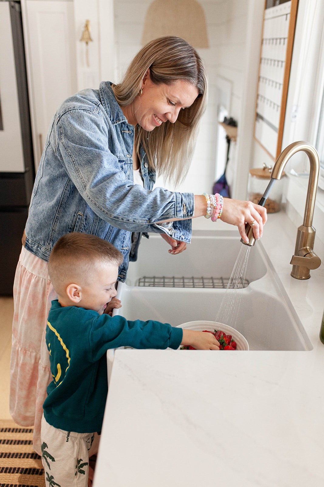 Woman by the sea with waves splashing
