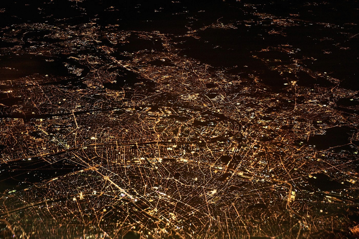 City lights at night from above, a global network
