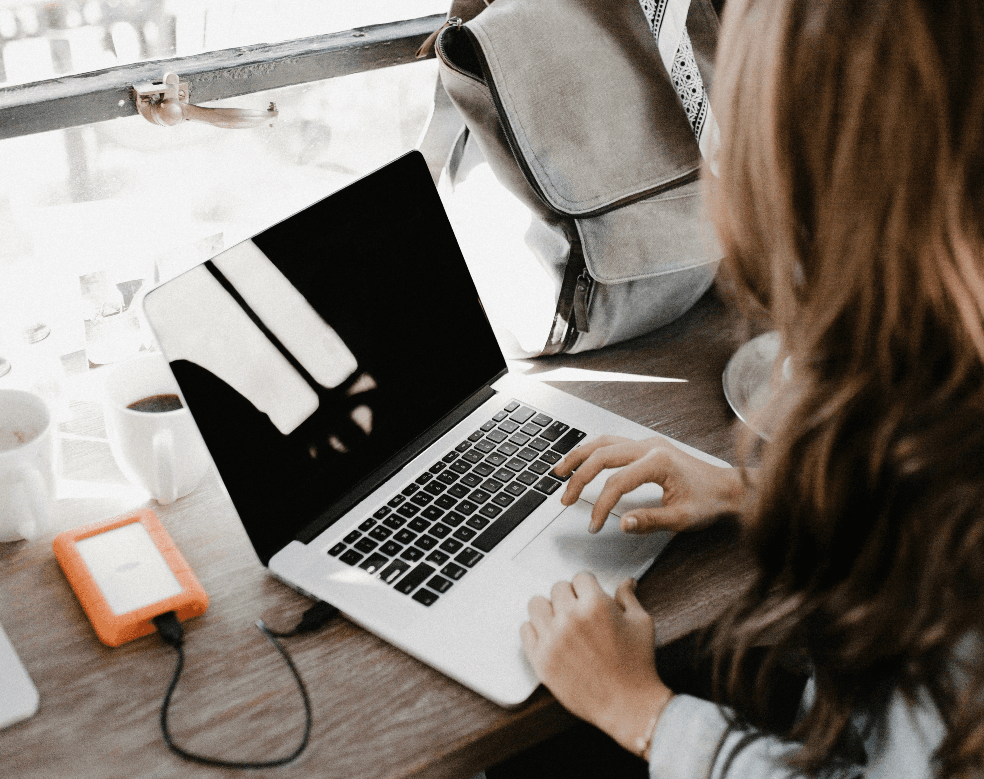 woman typing on a computer