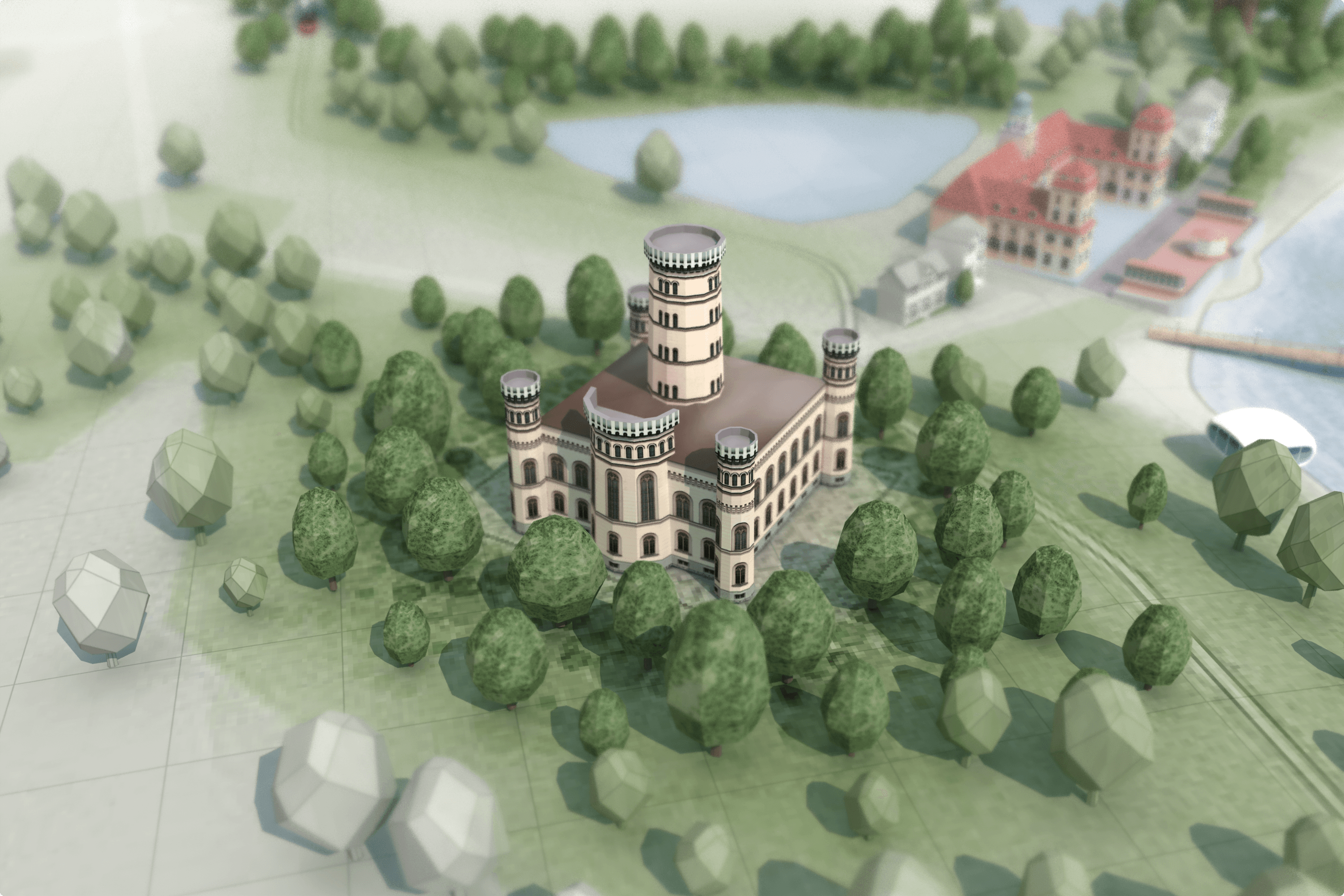 Top-down view of a model city with a castle and surrounding trees.