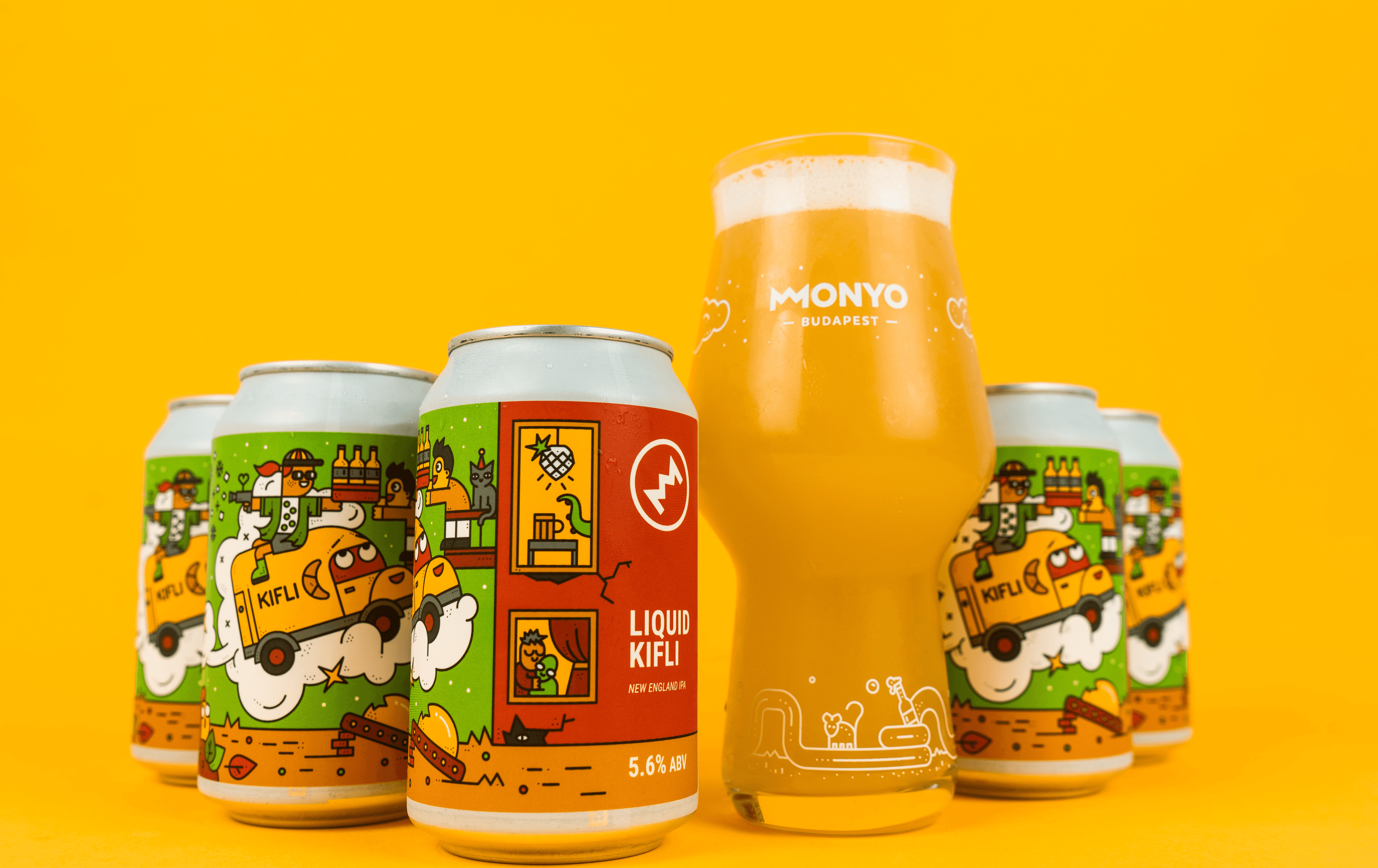 The team working together at a table with laptops, discussing business strategies or projects.