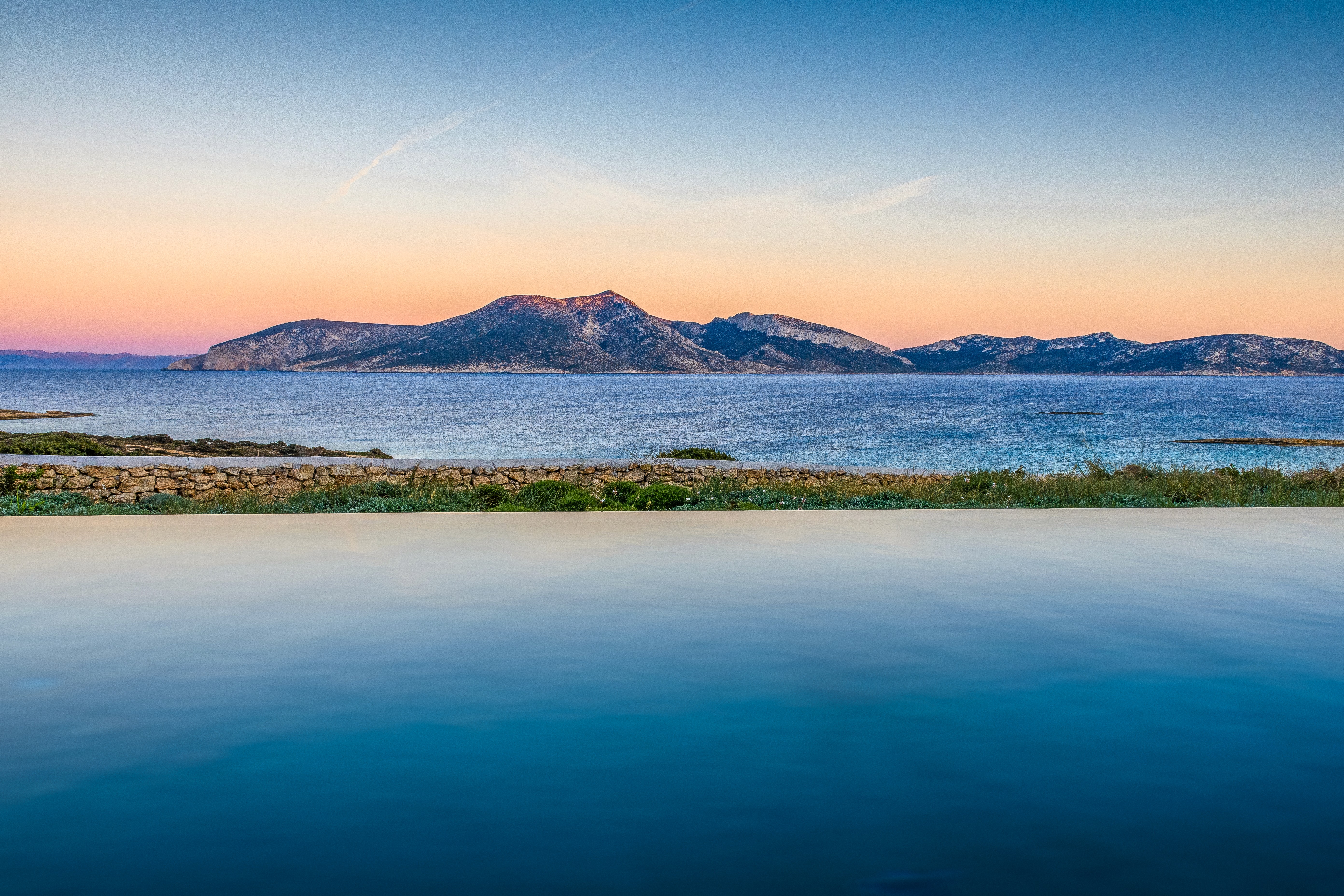 An infinity pool looking onto Keros from Koufonisia