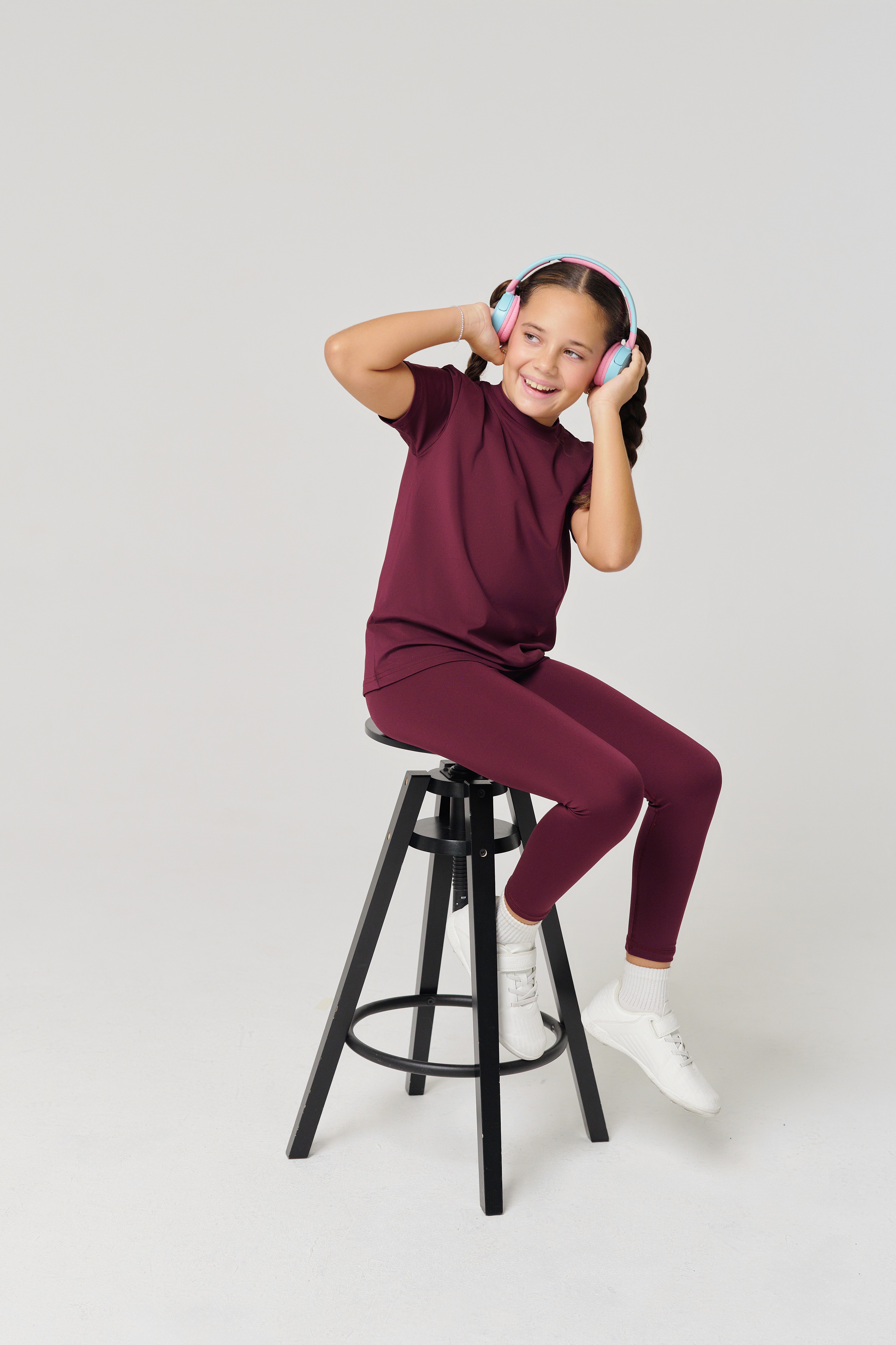 Friends laughing and posing inside a car