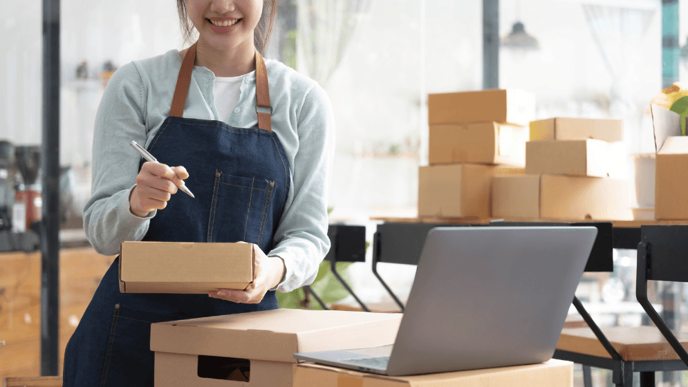 Business owner managing inventory and accounting