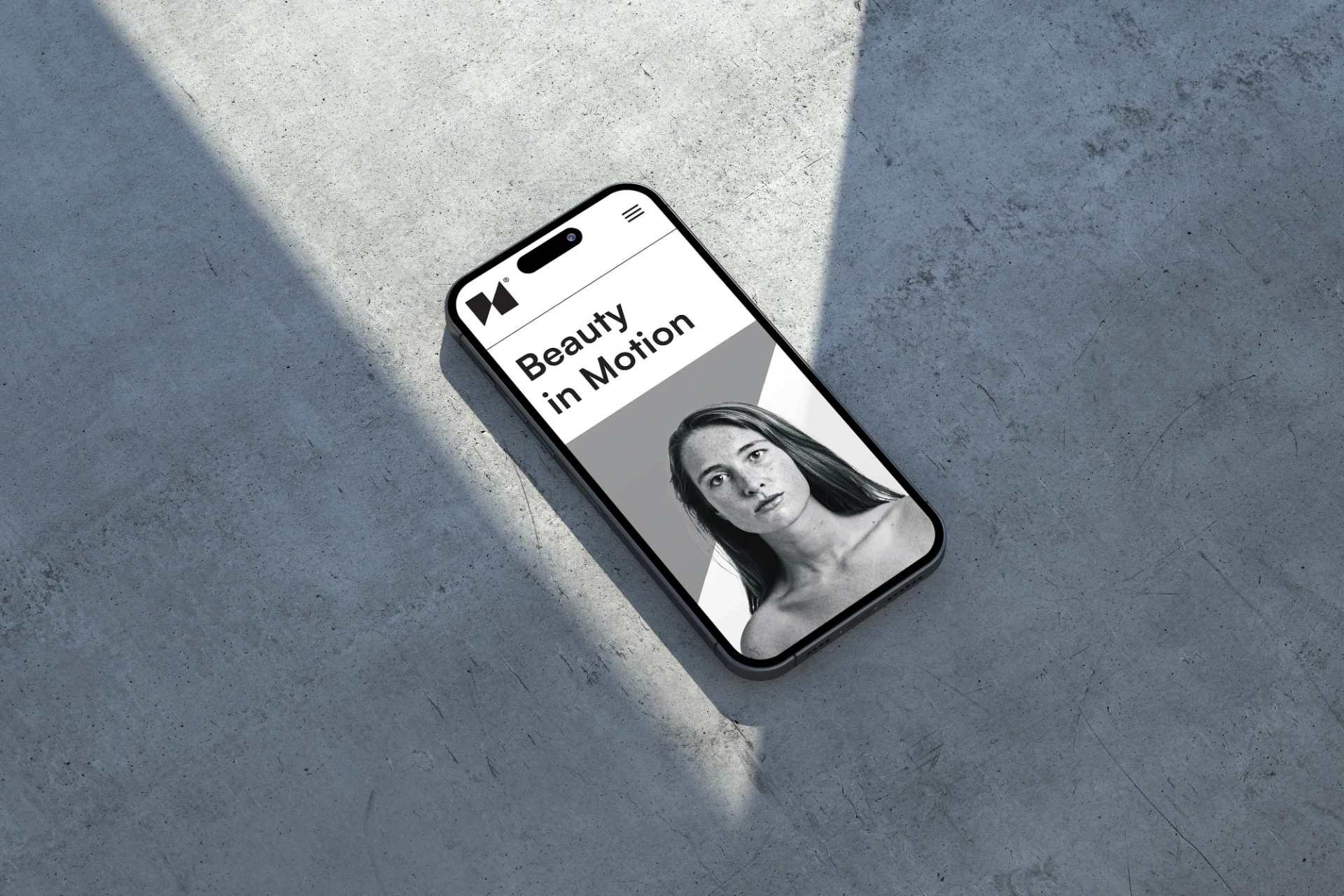 Smartphone with brand identity by freelance graphic designer Barcelona.