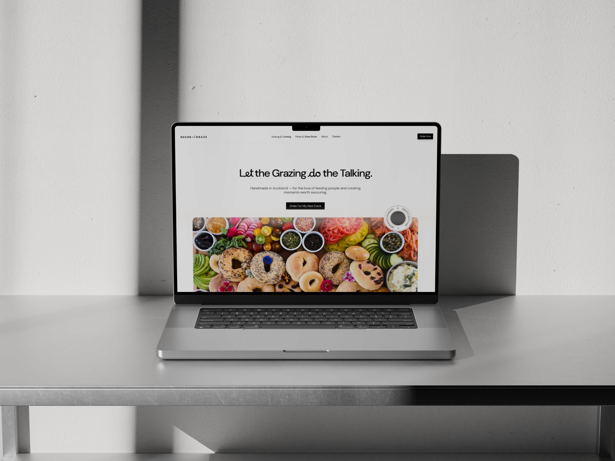 Decor and Graze Website Homepage on Laptop