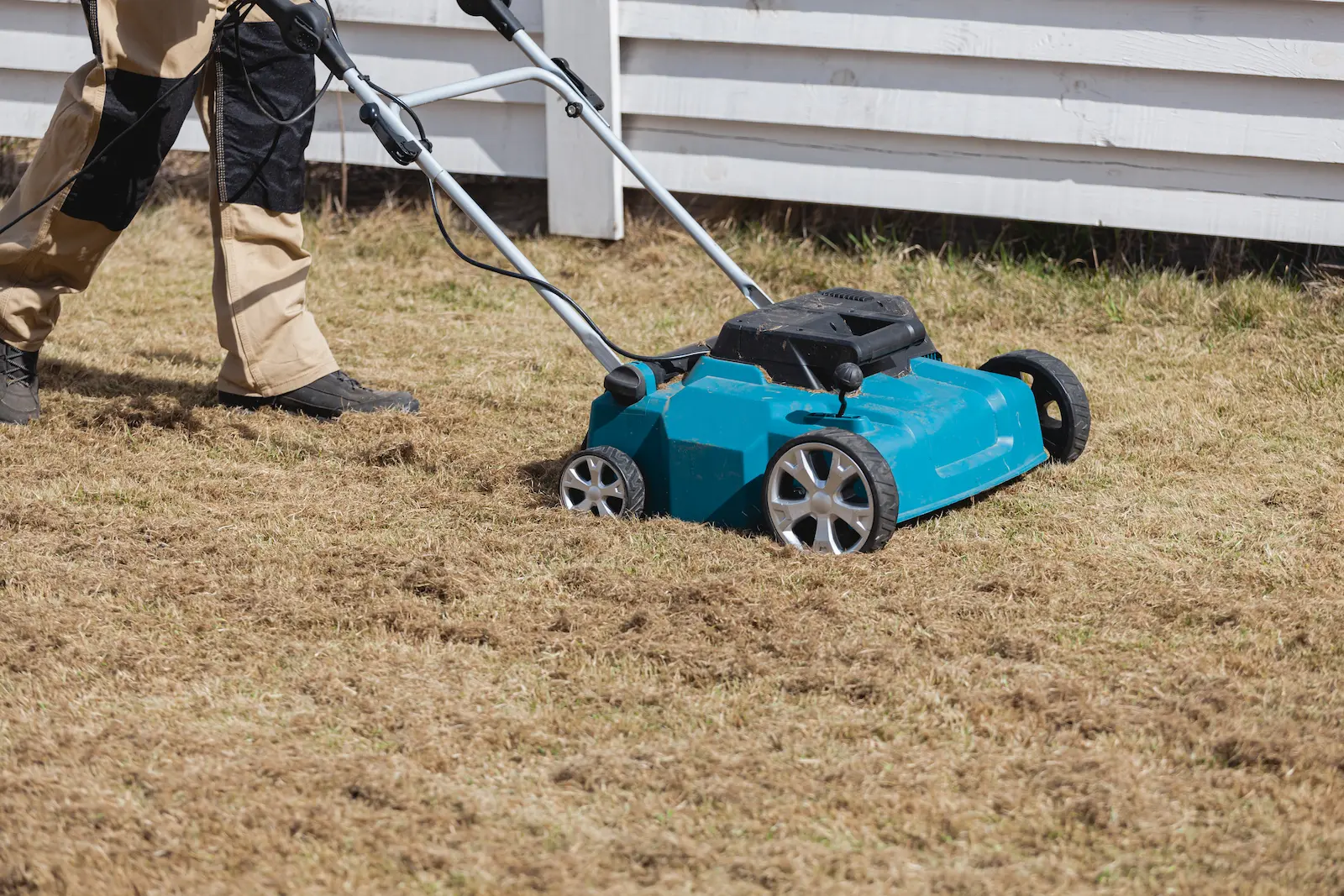 power raking spring lawn to dethatch lawn