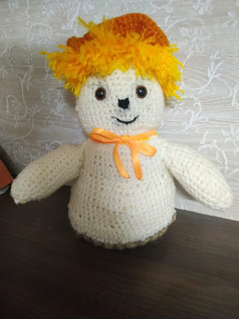 a group of people walking on a sidewalk