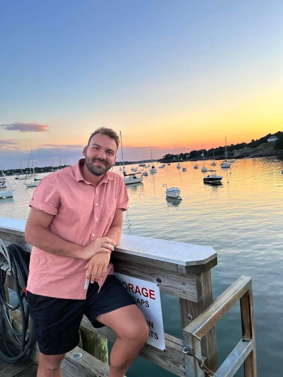 woman in black long sleeve shirt sitting on white couch
