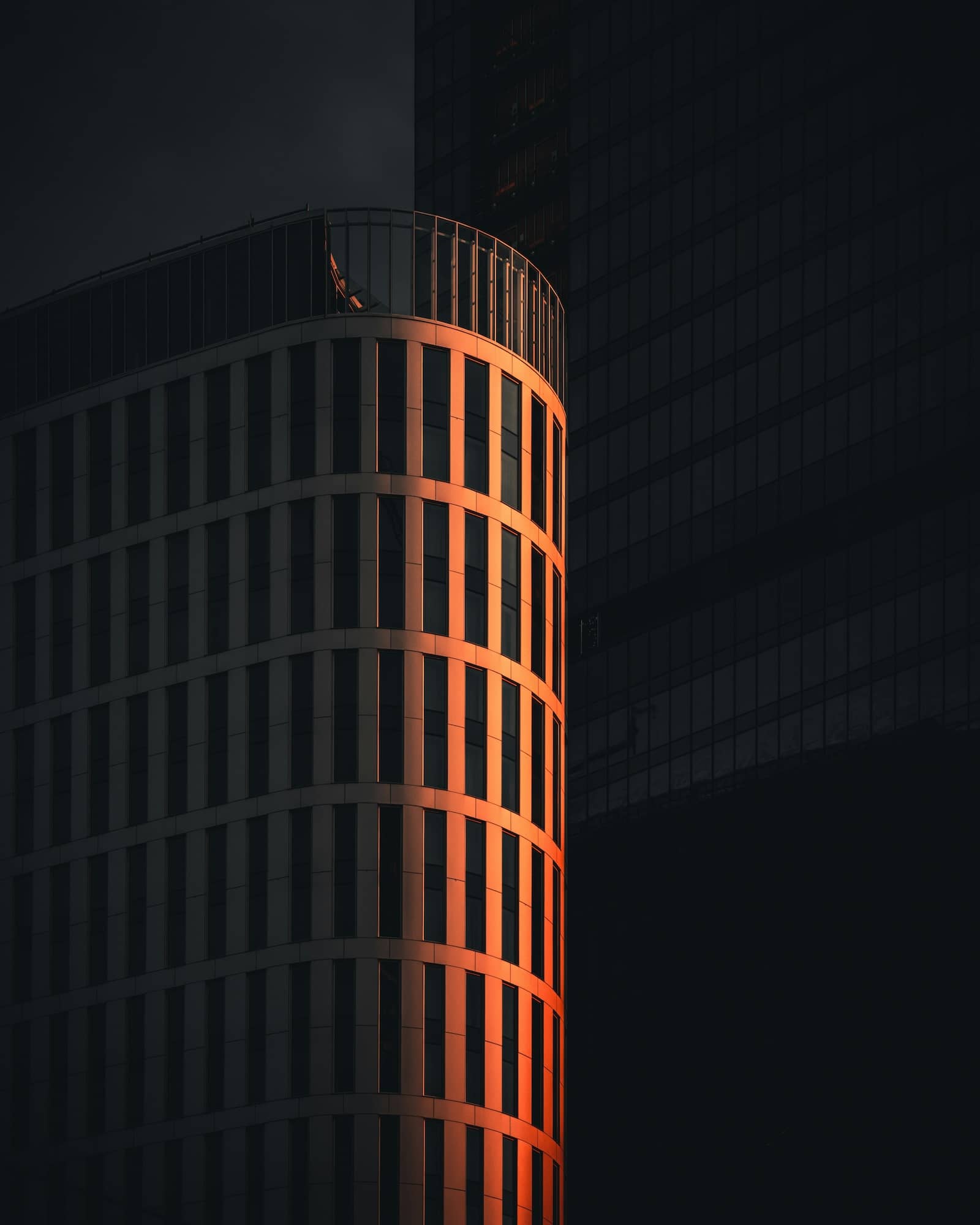 orange skyscraper at night