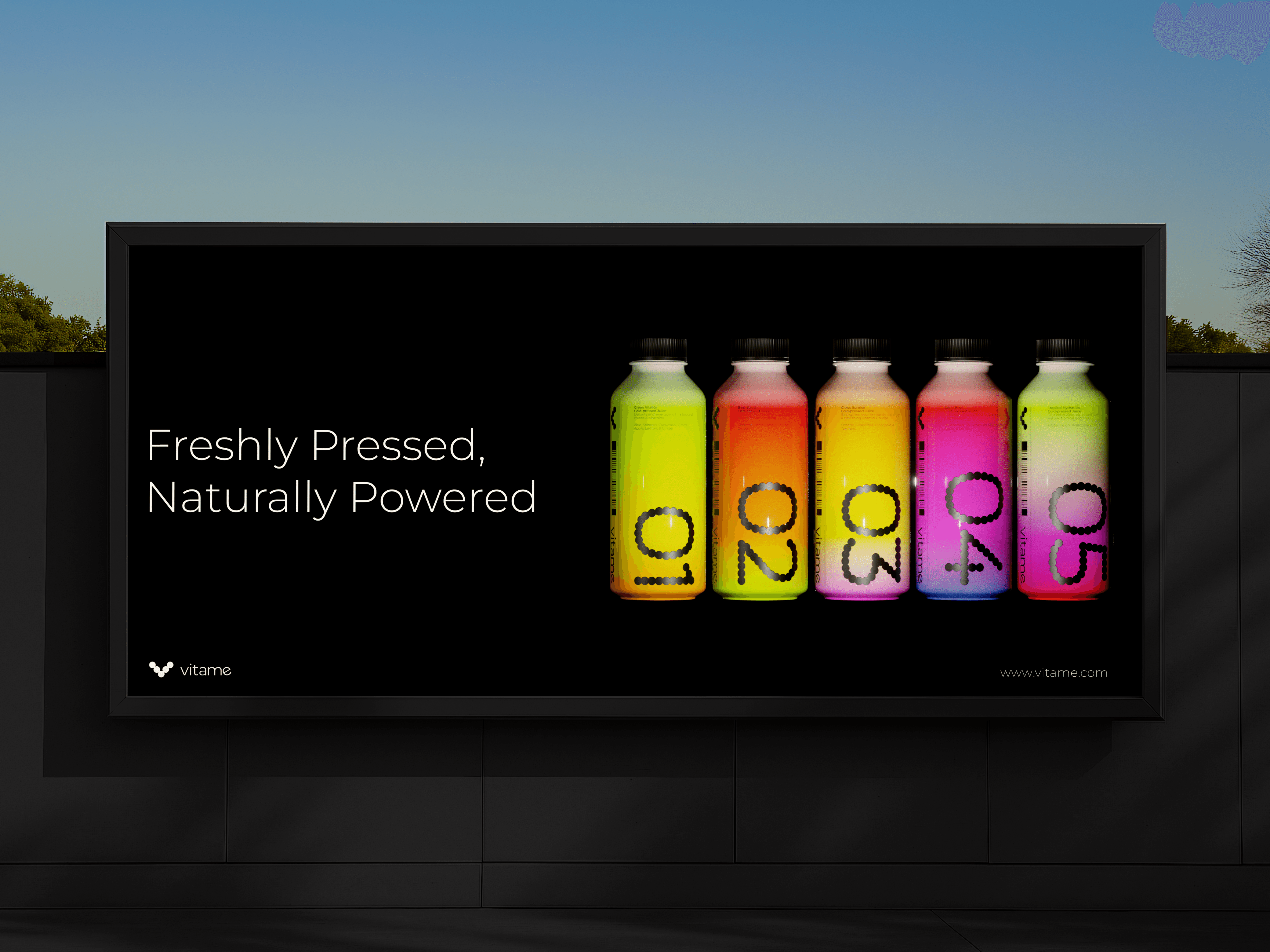 A Vitame billboard, featuring a photo of the vibrantly colored juice bottles with the brand's slogan: "Freshly Pressed, Naturally Powered"