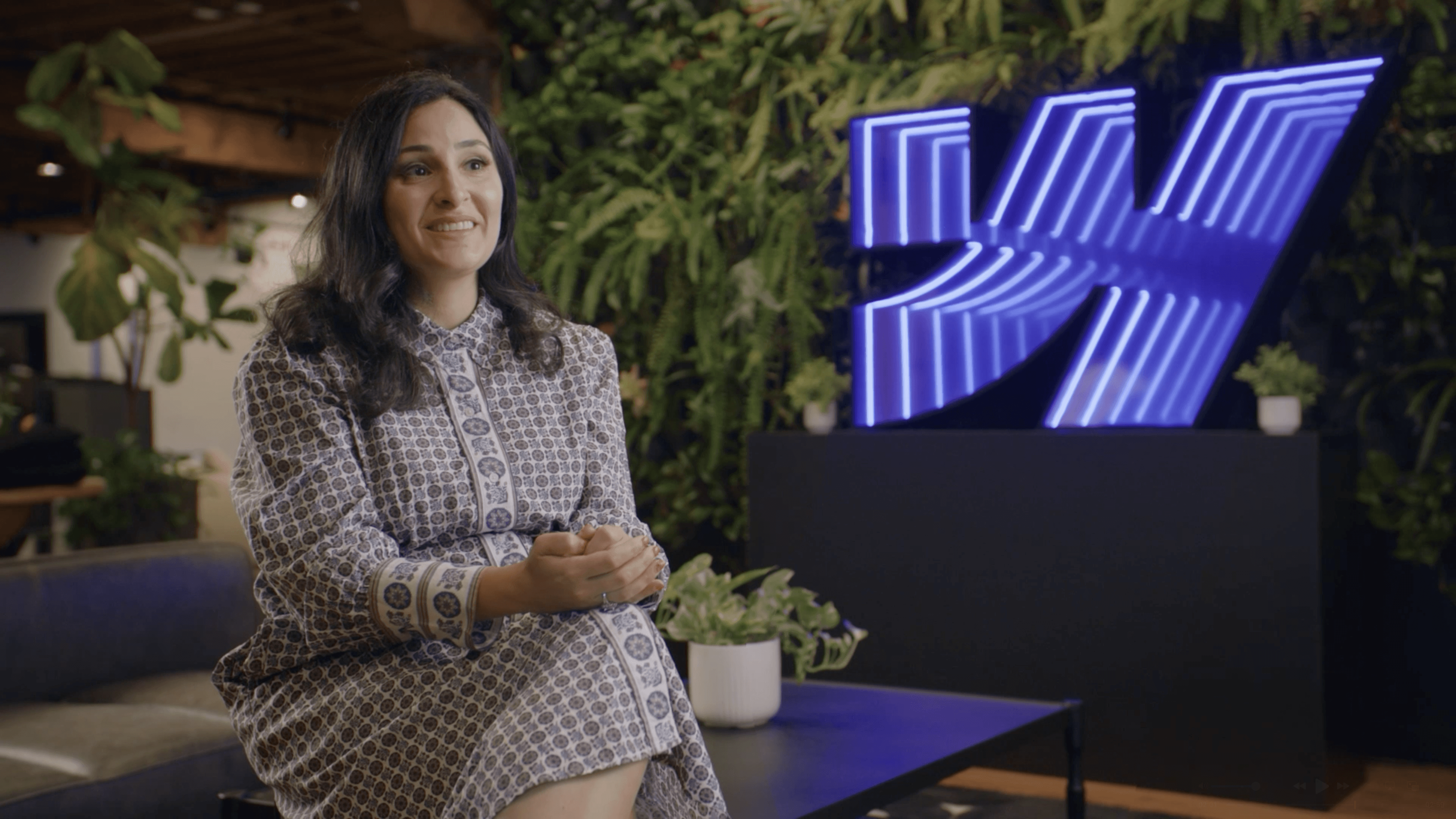 two women sitting on chair