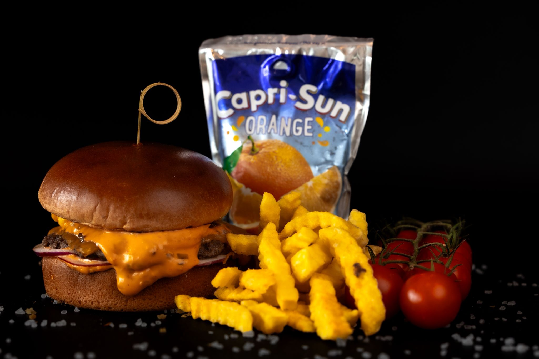 People in the restaurant holding burger