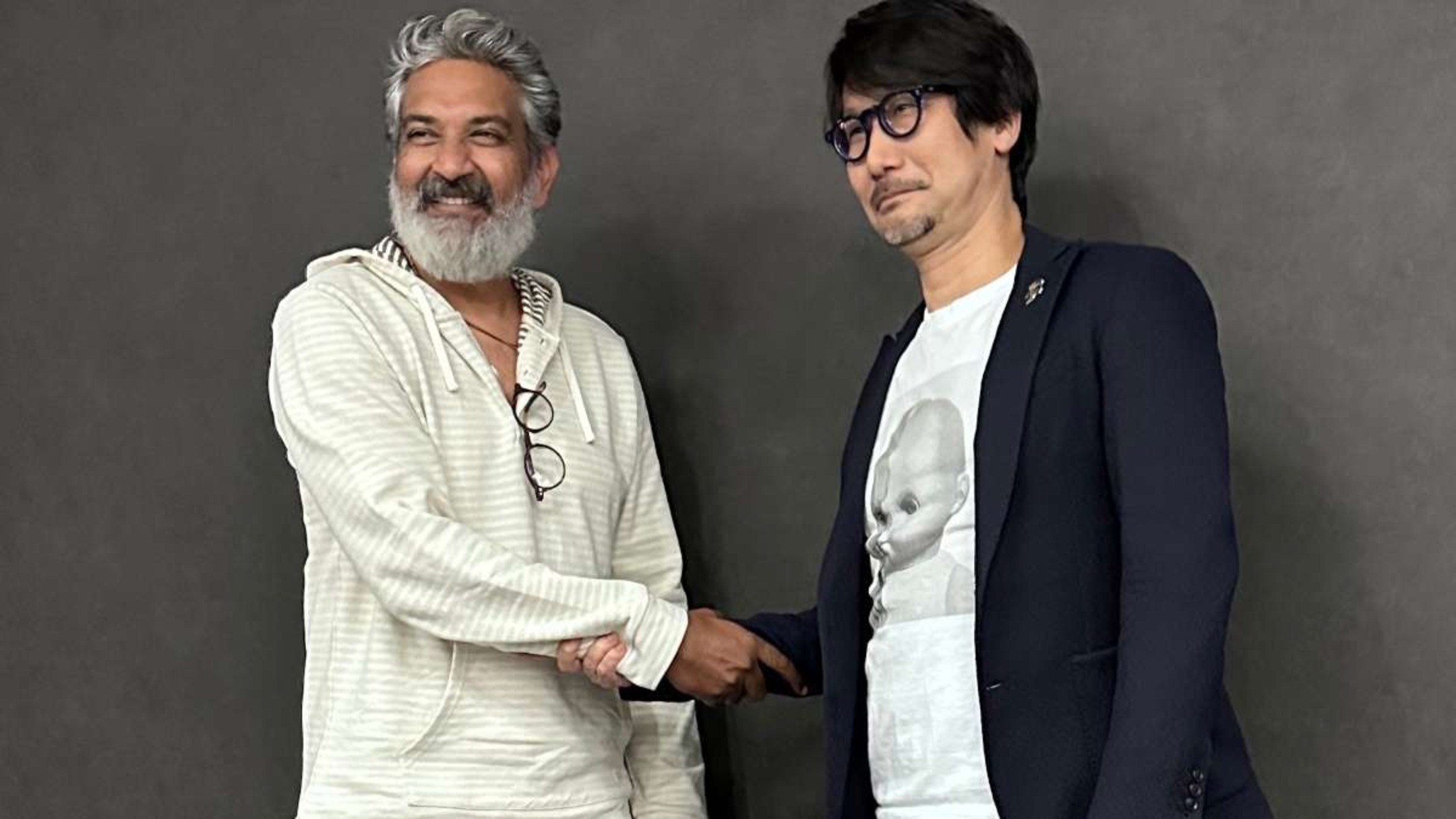 Hideo Kojima, Varanasi movie, Mahesh Babu, SS Rajamouli, Kojima Varanasi post, Kojima Instagram post, Kojima X post, Kojima India, Varanasi teaser, Varanasi poster, Rajamouli new movie, Varanasi Mahesh Babu teaser, Kojima collaboration rumors, Kojima Rajamouli meeting, Kojima Indian film, Kojima Varanasi speculation, Varanasi movie cast, Varanasi film update, Kojima Productions, Rajamouli Hollywood crossover, Mahesh Babu new movie, Indian cinema news, gaming director Kojima, Kojima viral post, Kojima trending India, Varanasi film hype, Kojima movie involvement, Kojima film rumors, Varanasi global reactions, Kojima fan theories, Kojima social media trend, Varanasi announcement, Varanasi official poster, Varanasi film details, Hideo Kojima trending, Varanasi Kojima link, Kojima Rajamouli collab theory, Varanasi release news, Kojima viral tweet, Kojima reacts to Varanasi, Kojima supports Indian cinema, Mahesh Babu global recognition, Varanasi movie buzz, Varanasi hype worldwide, Kojima fandom reaction, Kojima industry speculation, Kojima behind the scenes rumor