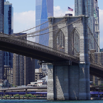 Brooklyn, New York bridge with building in the background for styling Creative Philosophy page about Dali Adekunle