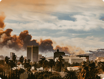 person writing on a piece of paper 