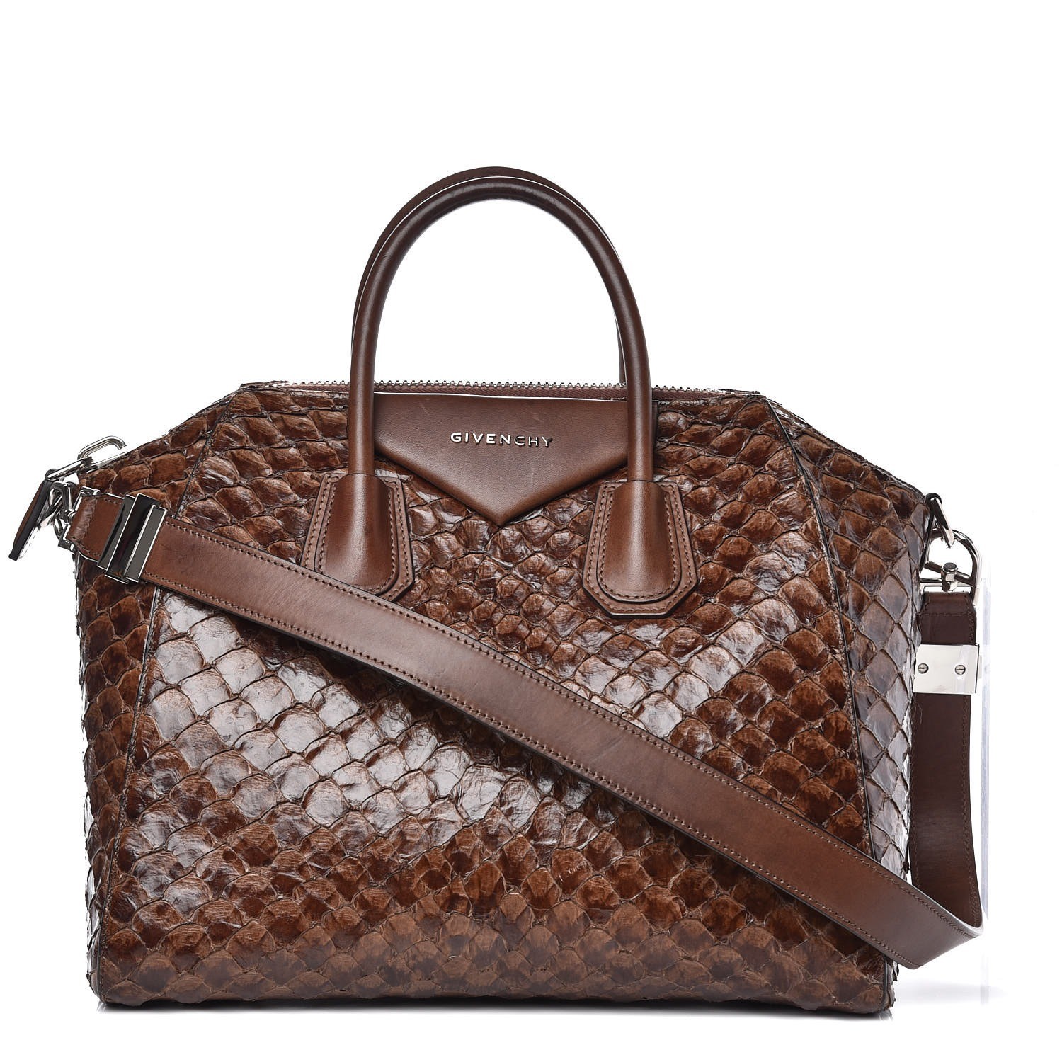 two people looking at a tablet and smiling