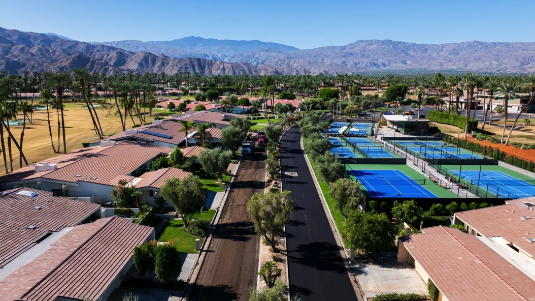 Aerial side-by-side of old and new asphalt roads