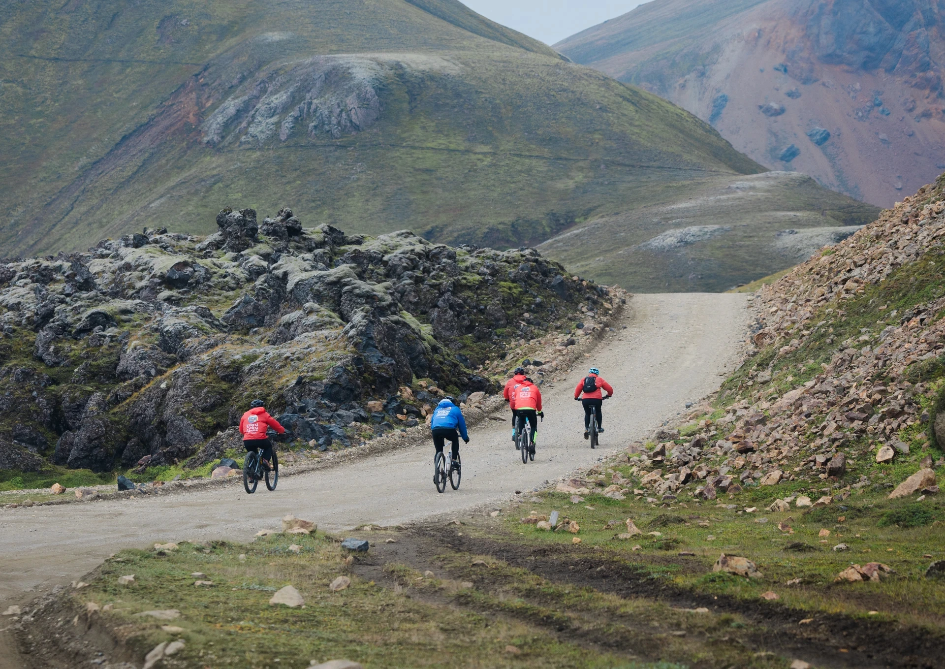 cyclists pedal into the wild Iceland nature 