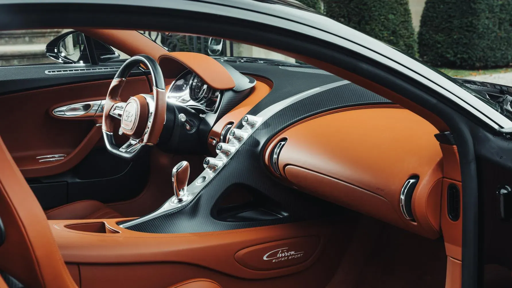 Hypercar interior, tan leather and aluminum