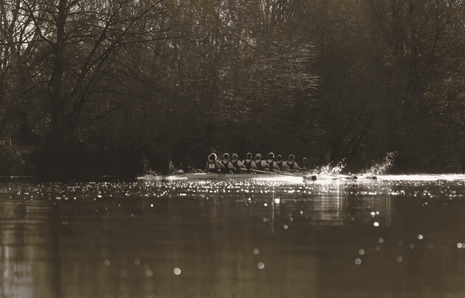 husband and wife working happily on a laptop