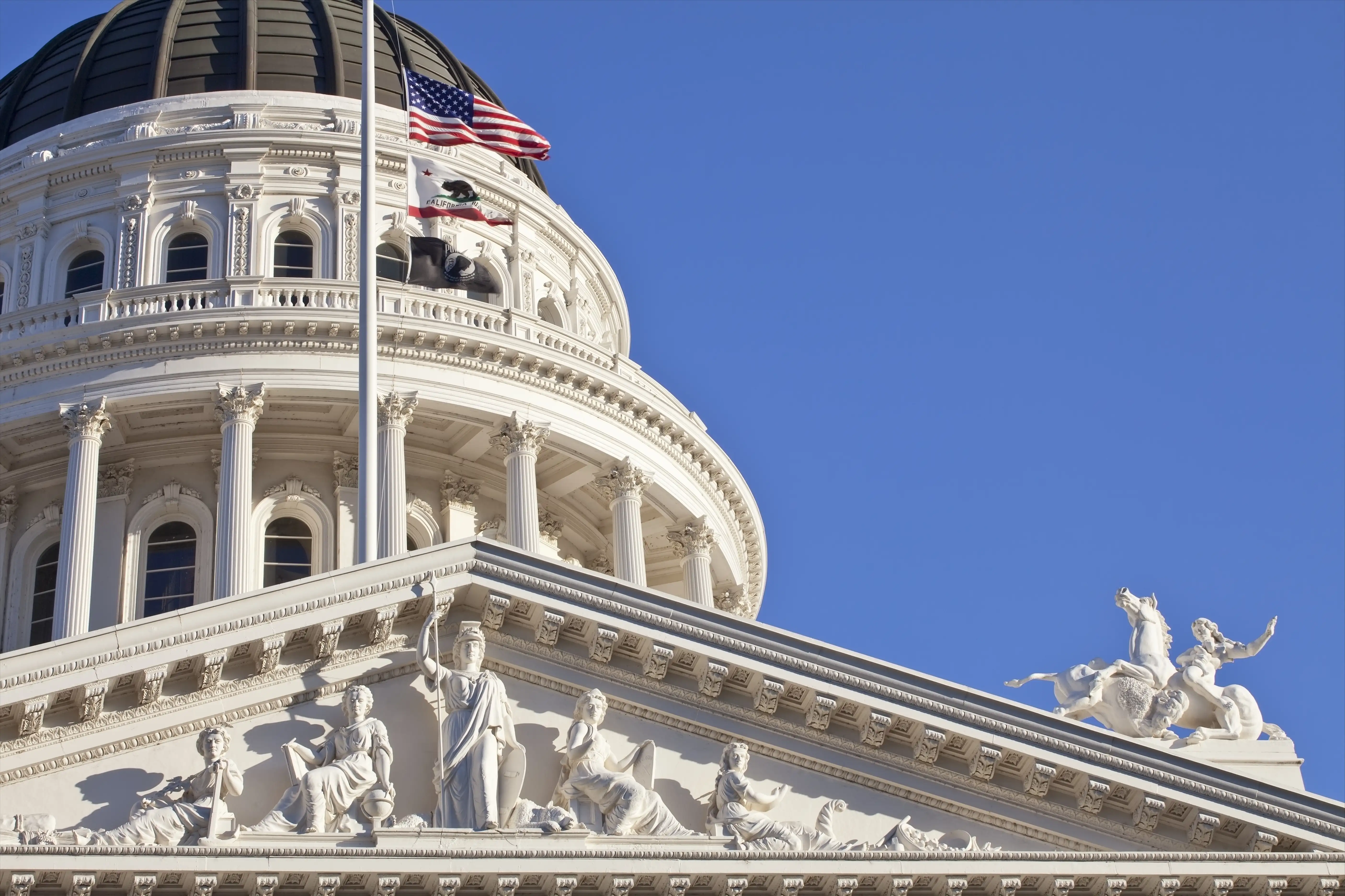 The California State Capitol building in Sacramento, representing wage and hour law rules for state, county, and municipal public employees under FLSA and Labor Code section 220