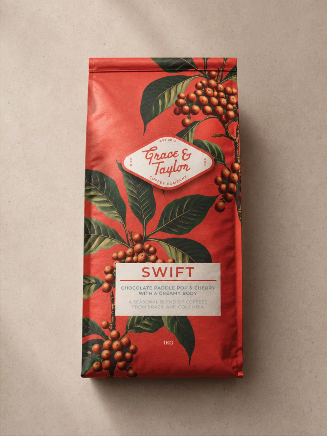Grace & Taylor Coffee Co. brand identity design on a red coffee bag with coffee cherry illustration
