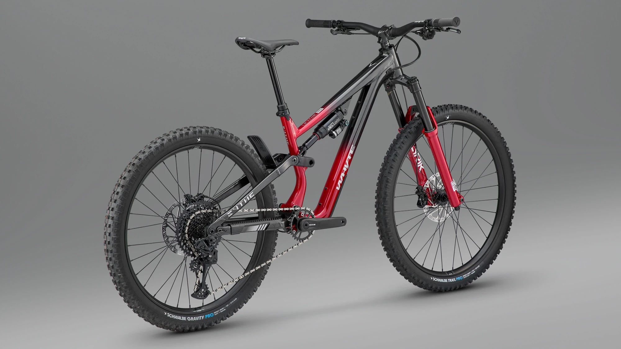 Full studio view of Whyte Sythe mountain bike featuring red and black frame design, long-travel suspension, and modern trail geometry setup.