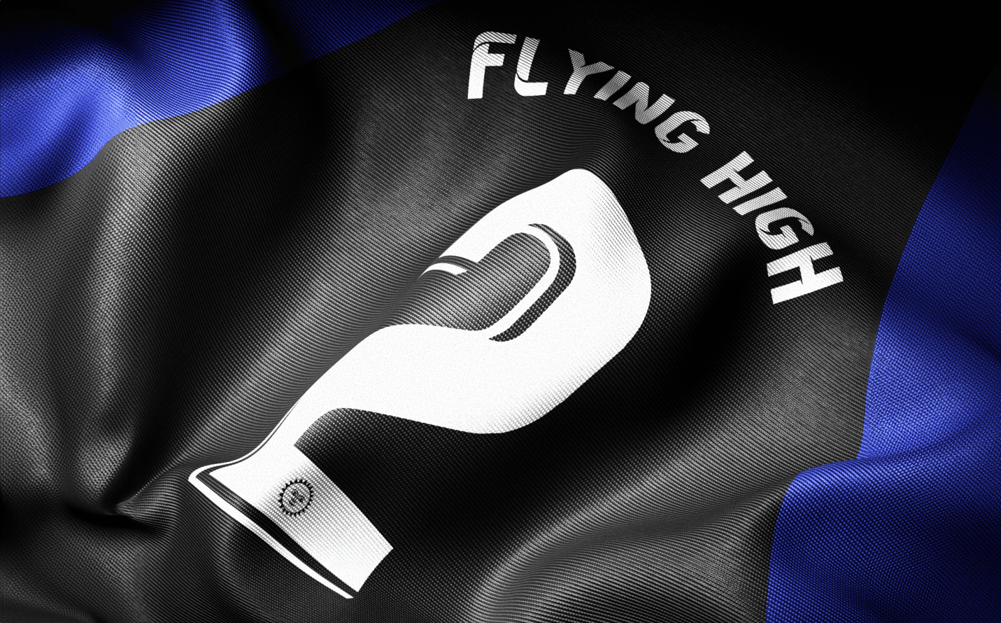 Close-up of custom soccer jersey designed for 'Flying High Part Two' EP, highlighting bold colors and graphic details.