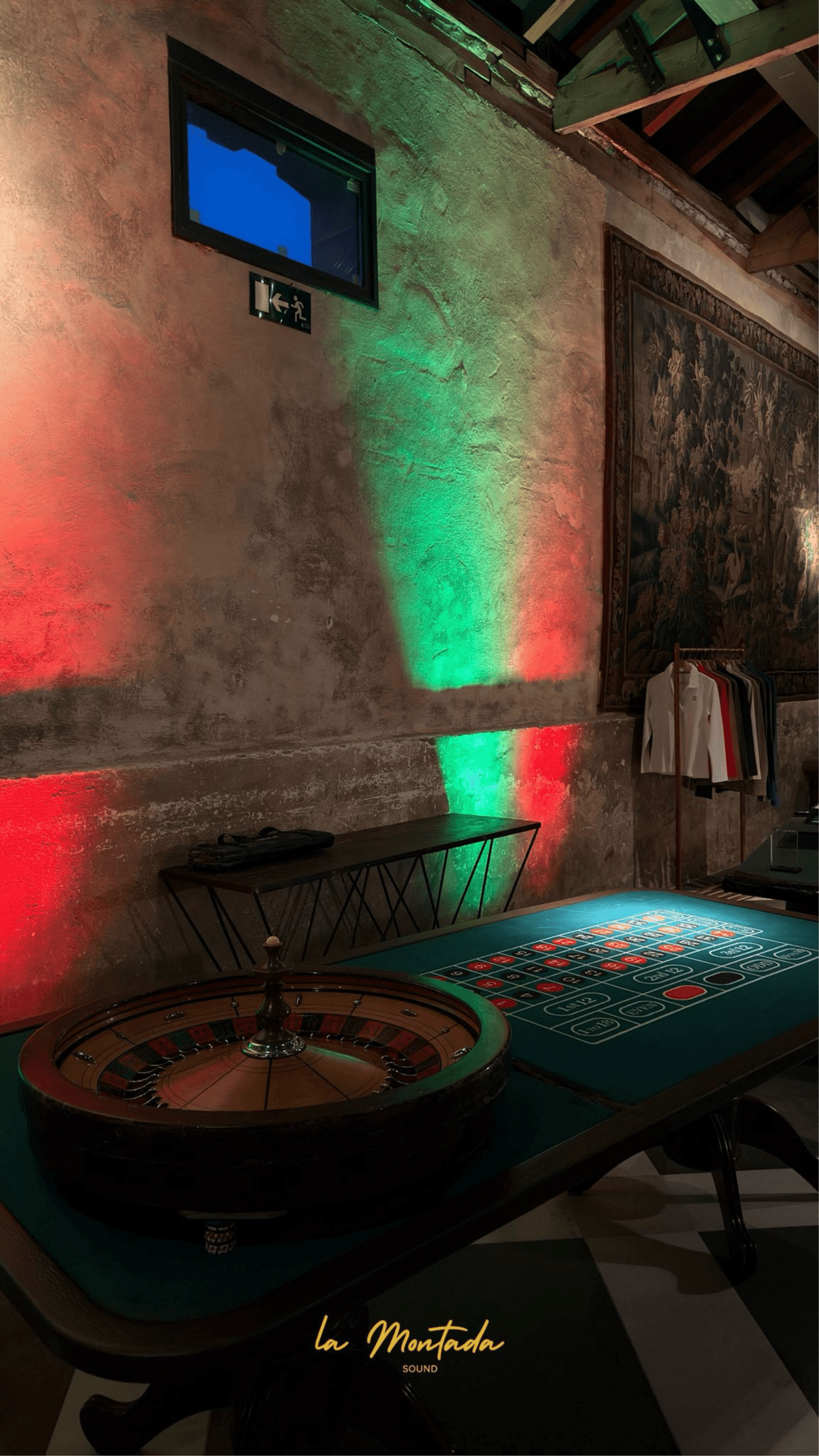 brown wooden lounger near body of water