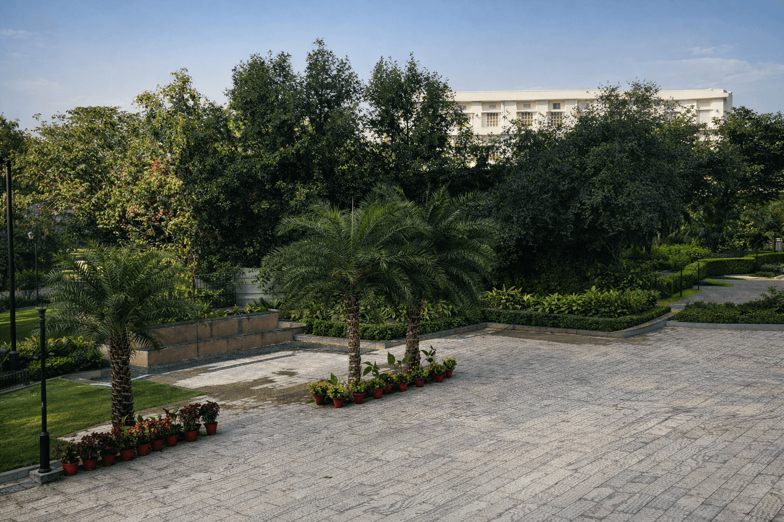 Large outdoor plaza with Stoovo stone flooring in landscaped commercial space Delhi